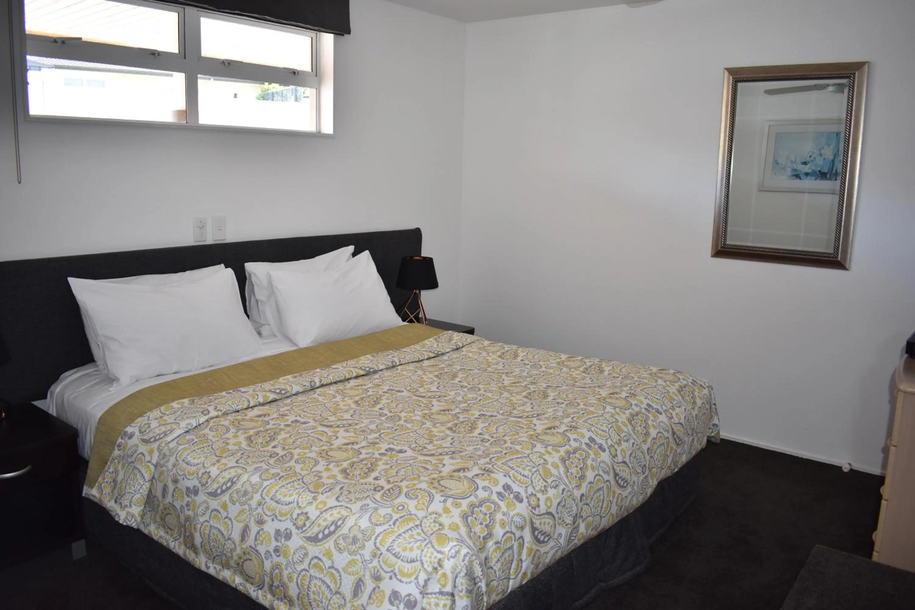 Bed in Baywatch Motor Inn