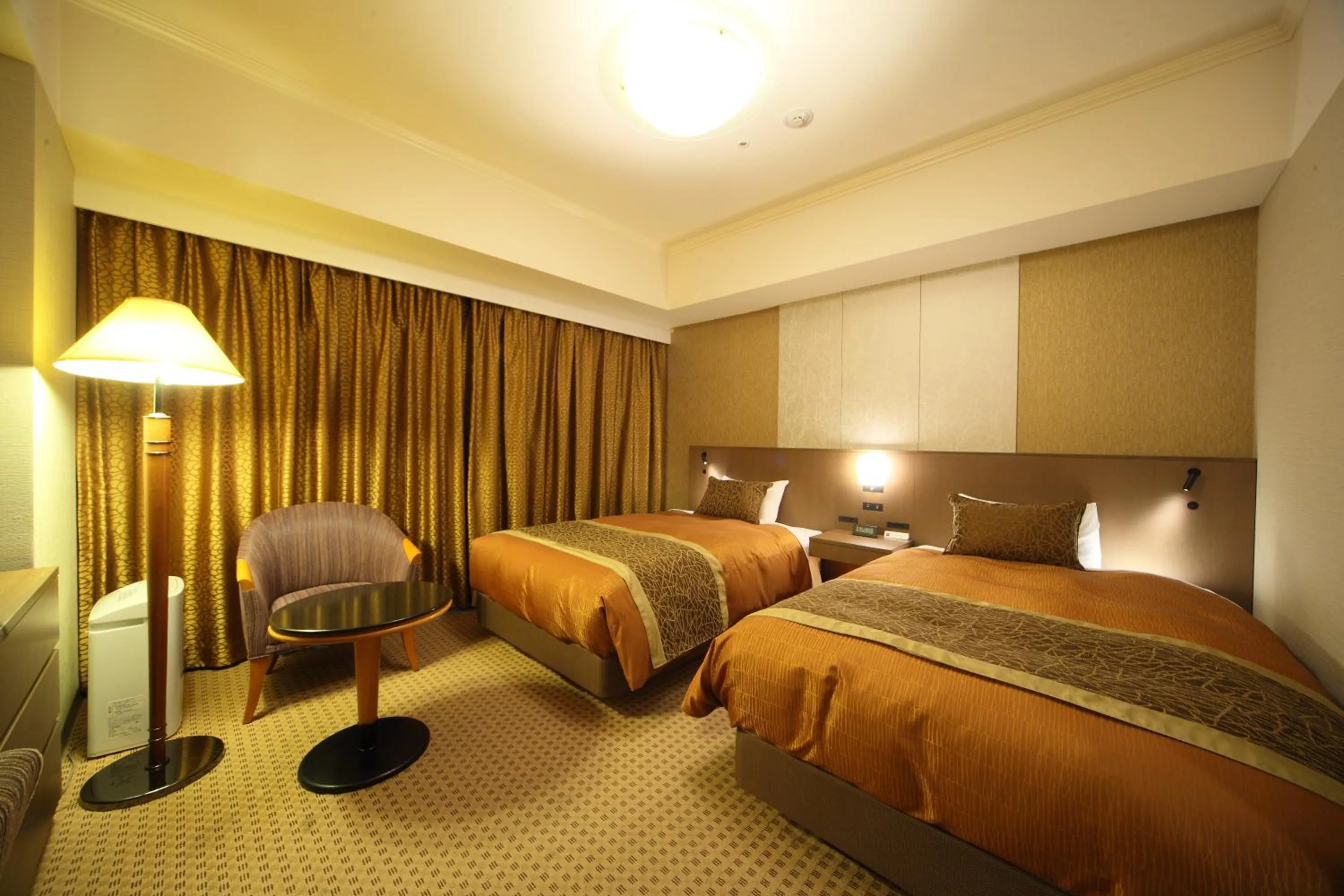 Bed in Hotel Metropolitan Nagano