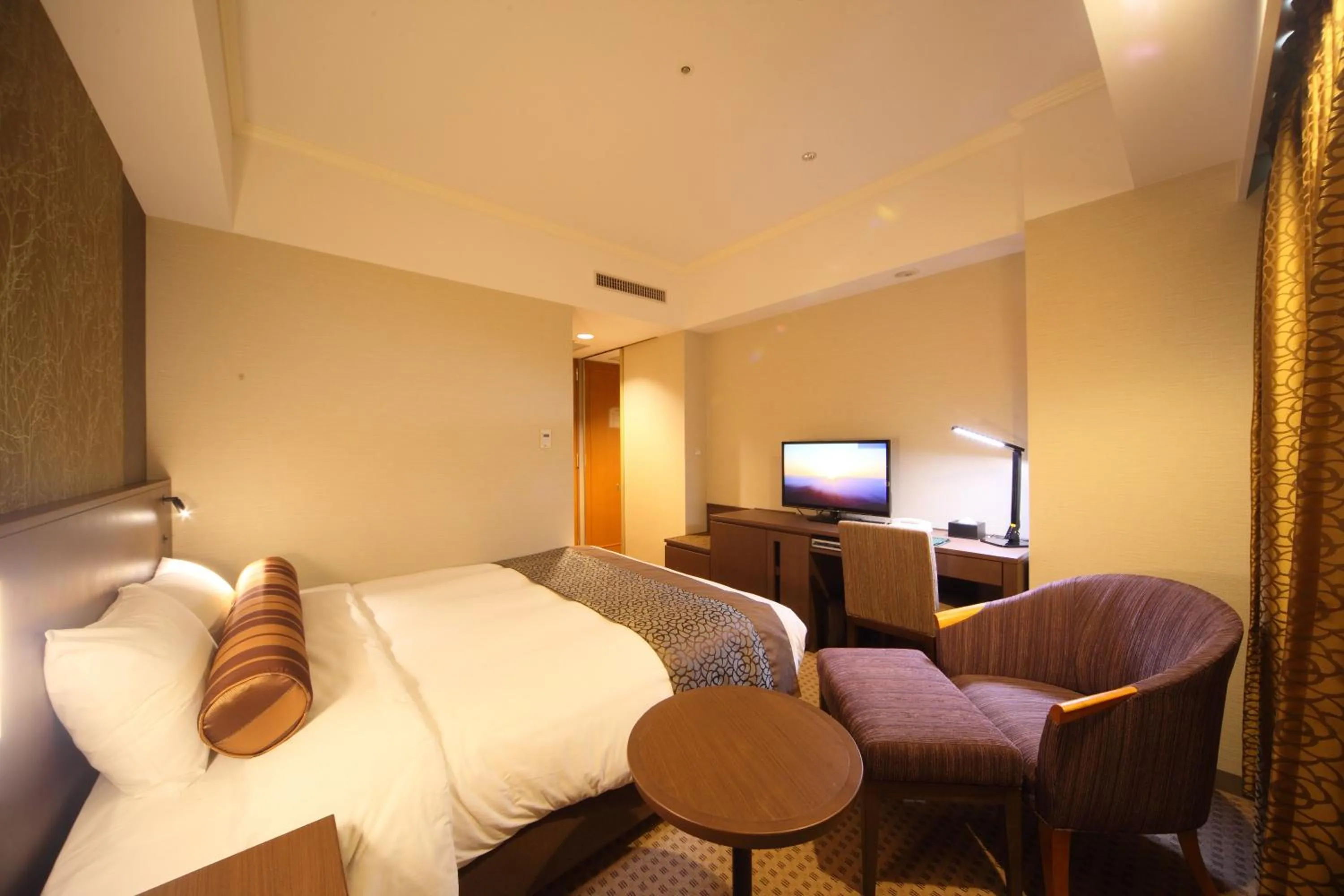 Bed in Hotel Metropolitan Nagano