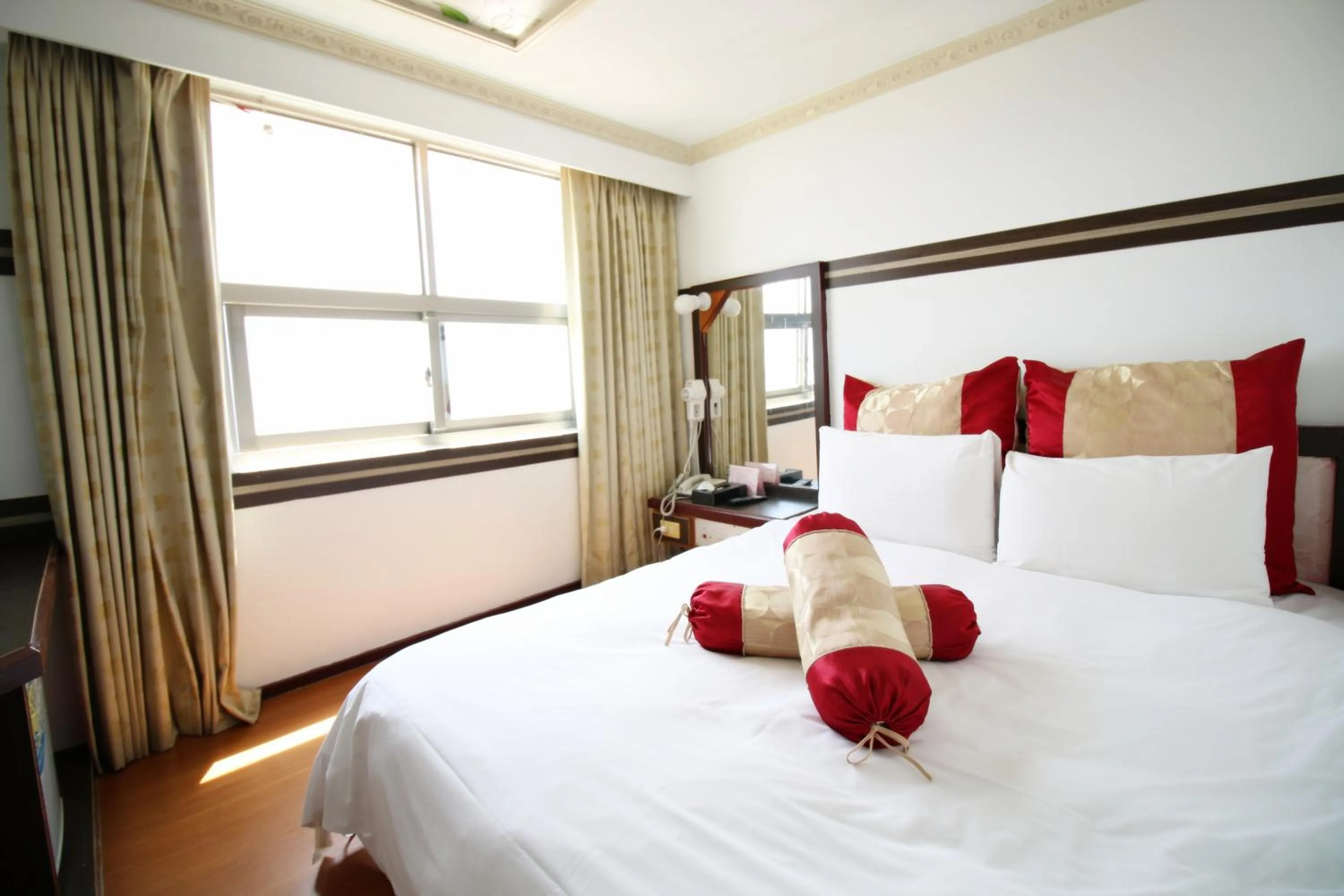 Bed in Sheng-Kuo Hotel