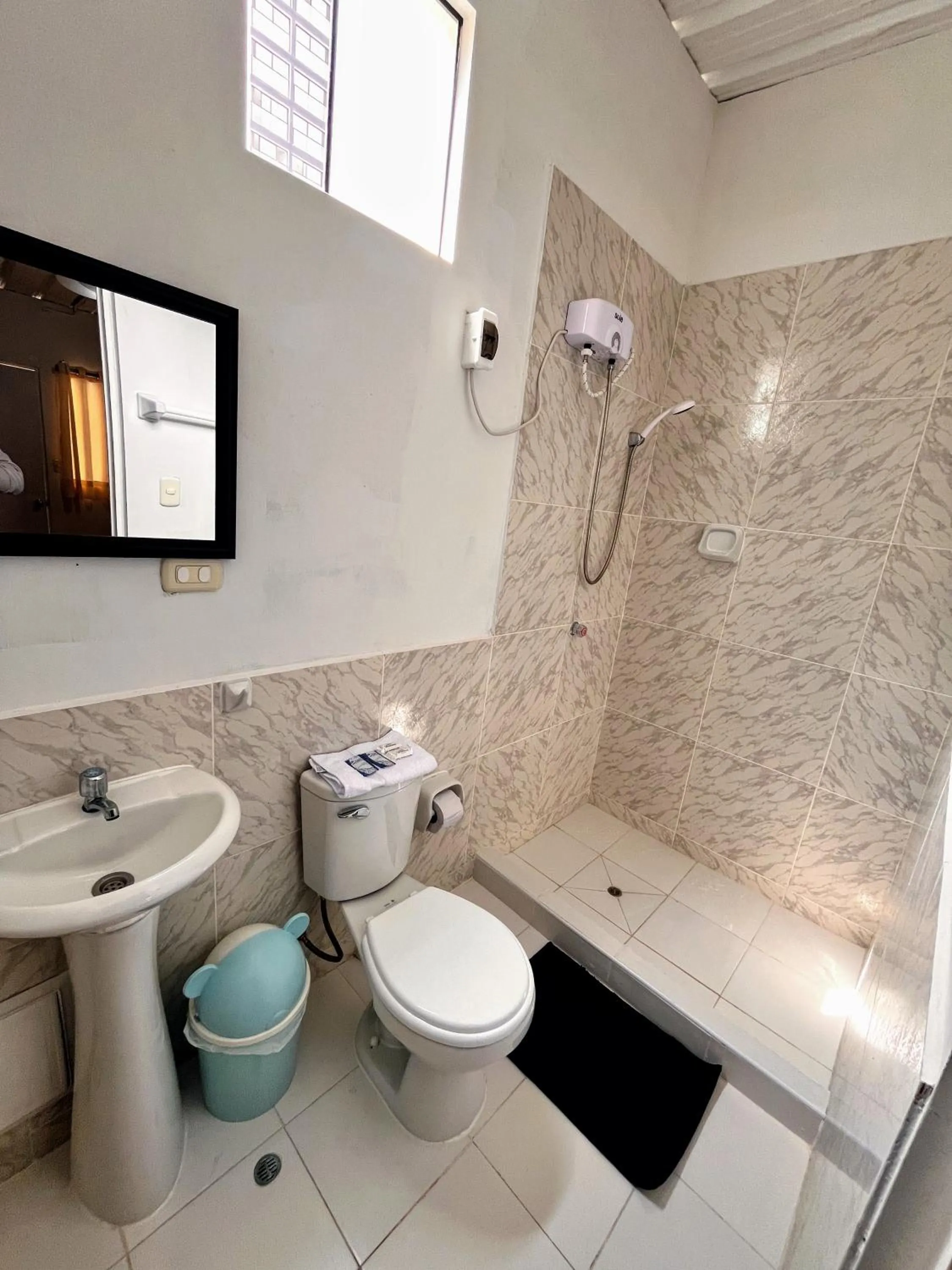 Shower in Samanai Wasi