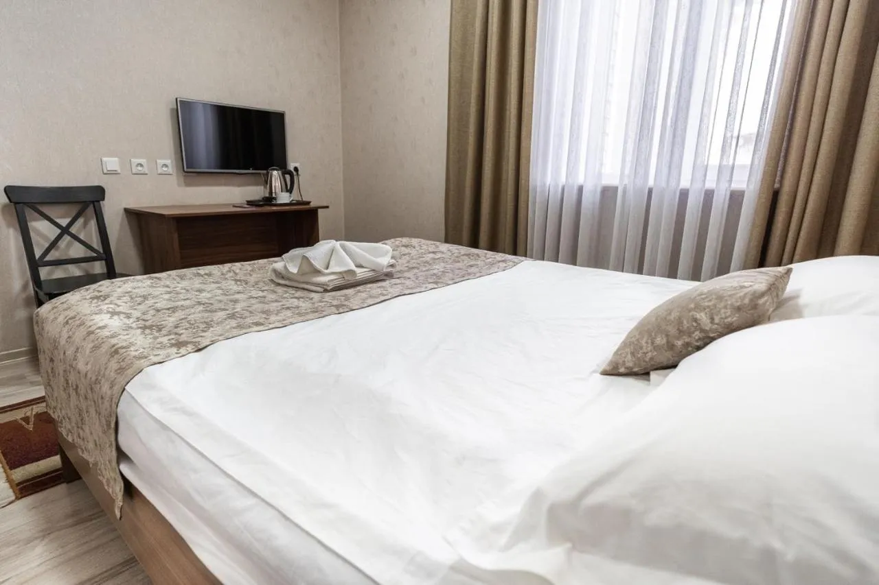 Bed in Madanur Hotel