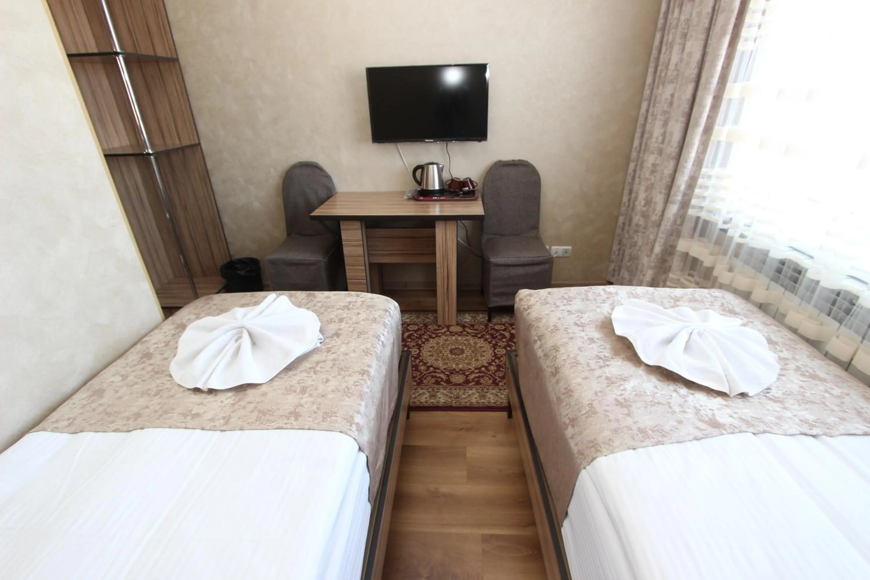 Bed in Madanur Hotel