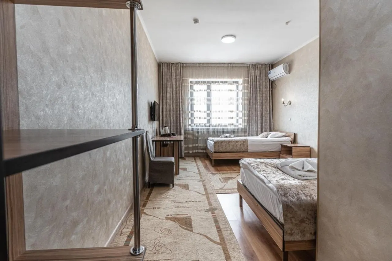 Bed in Madanur Hotel