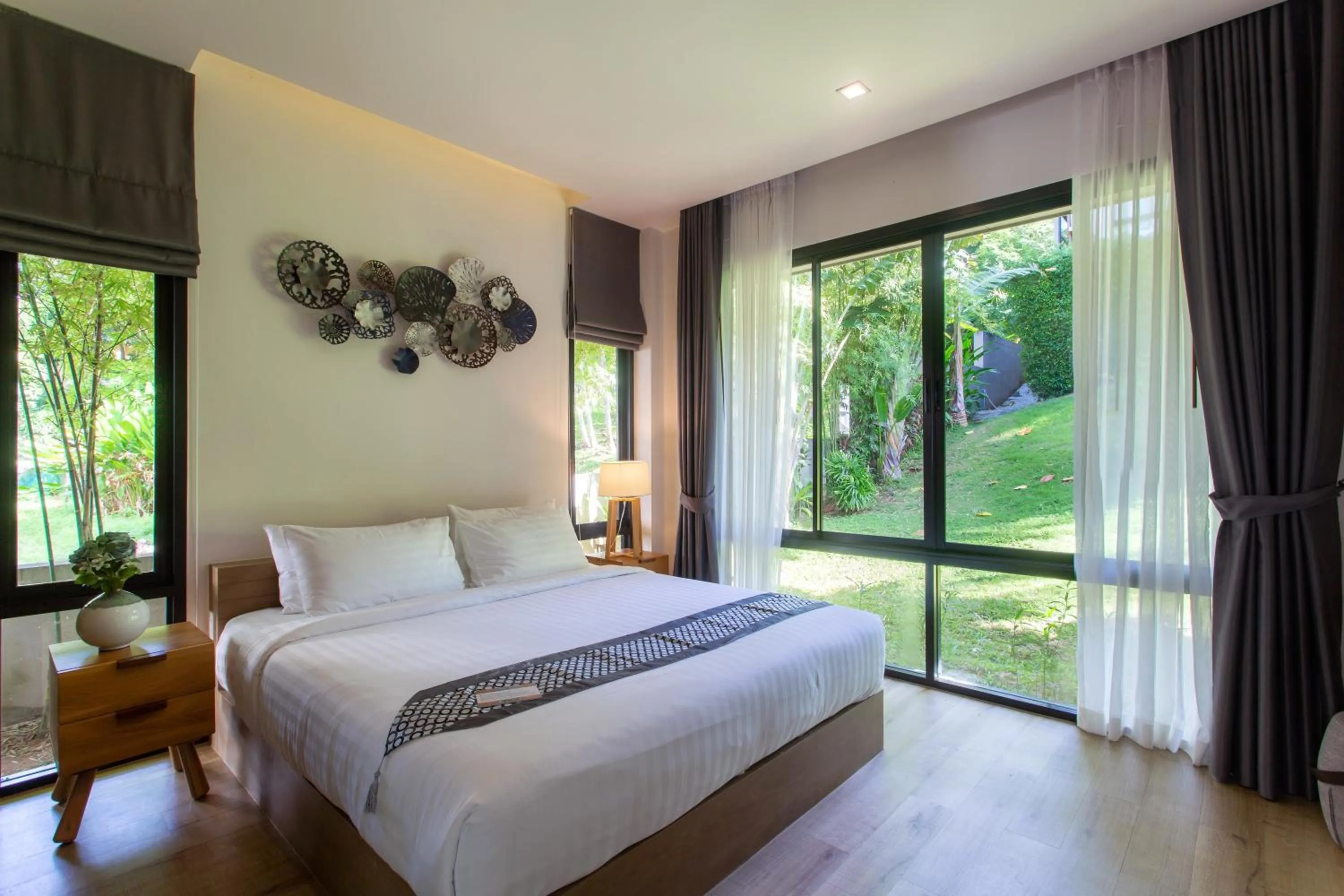 Bed in CHUZ Villas Samui SHA Plus