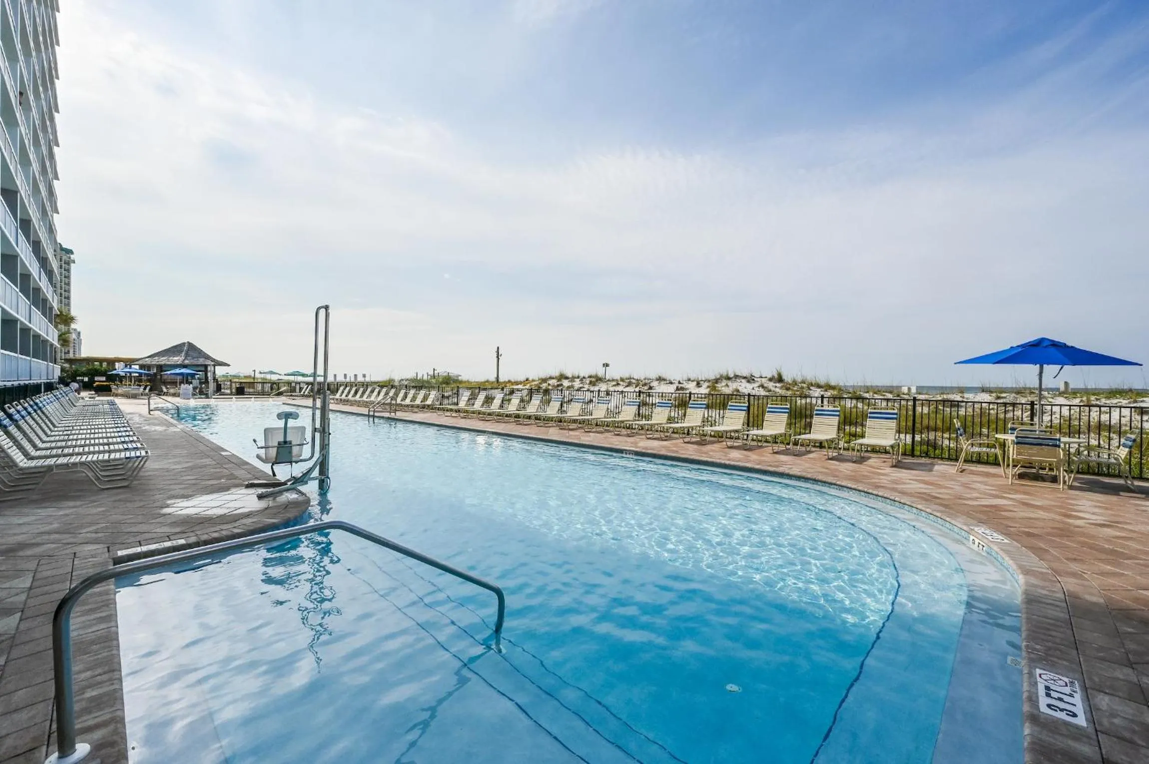 Swimming pool in Pelican Beach Resort by Tufan