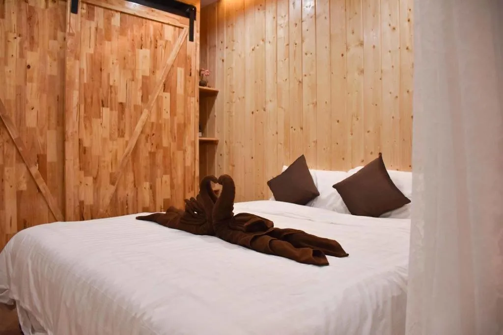 Bed in Momento Bangtao Beach