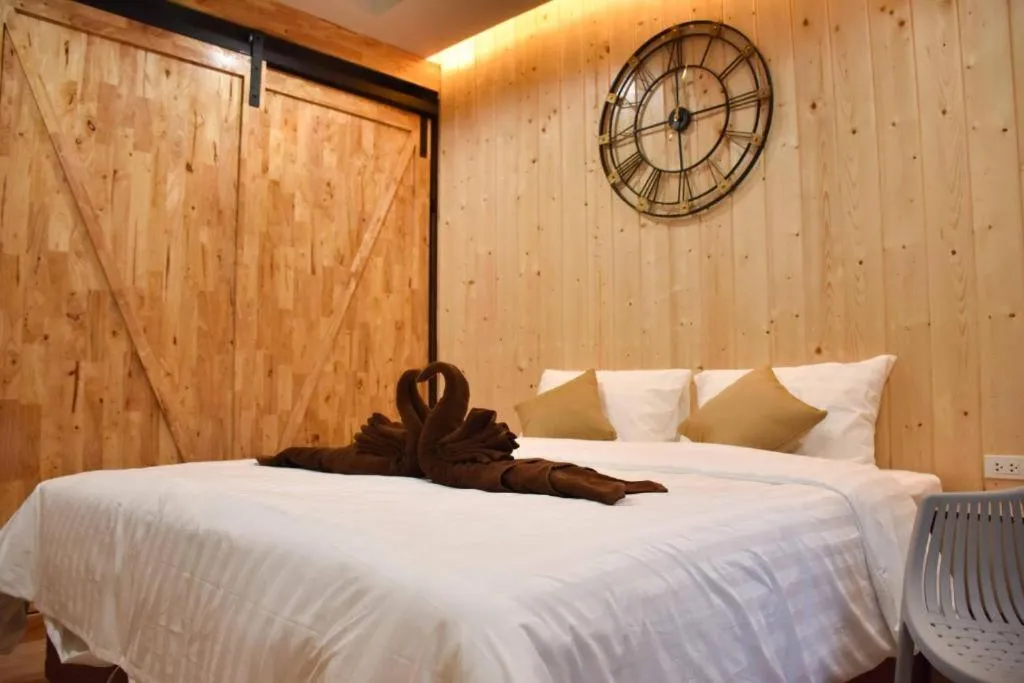 Bed in Momento Bangtao Beach