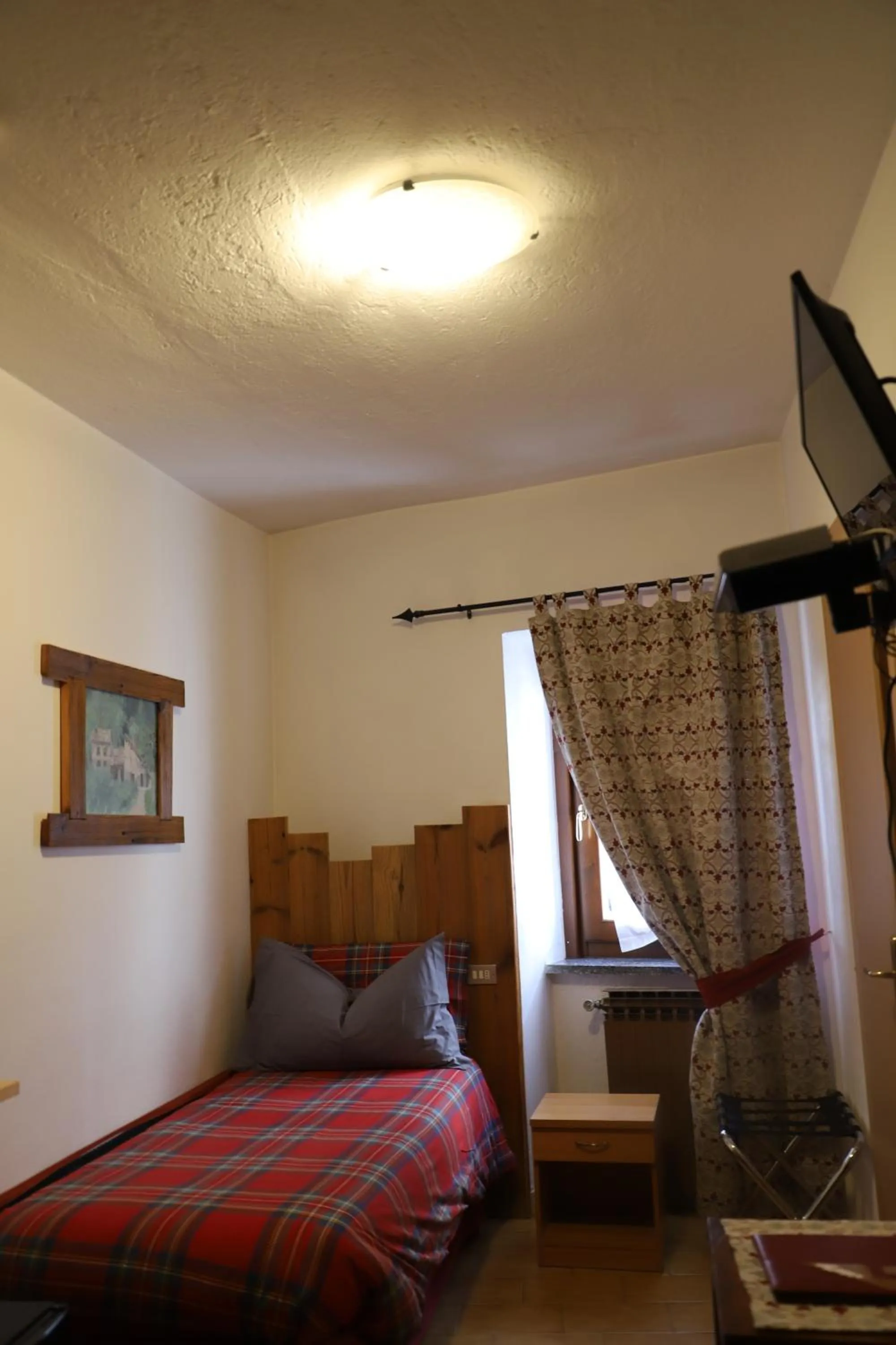 Bed in Hotel Bucaneve