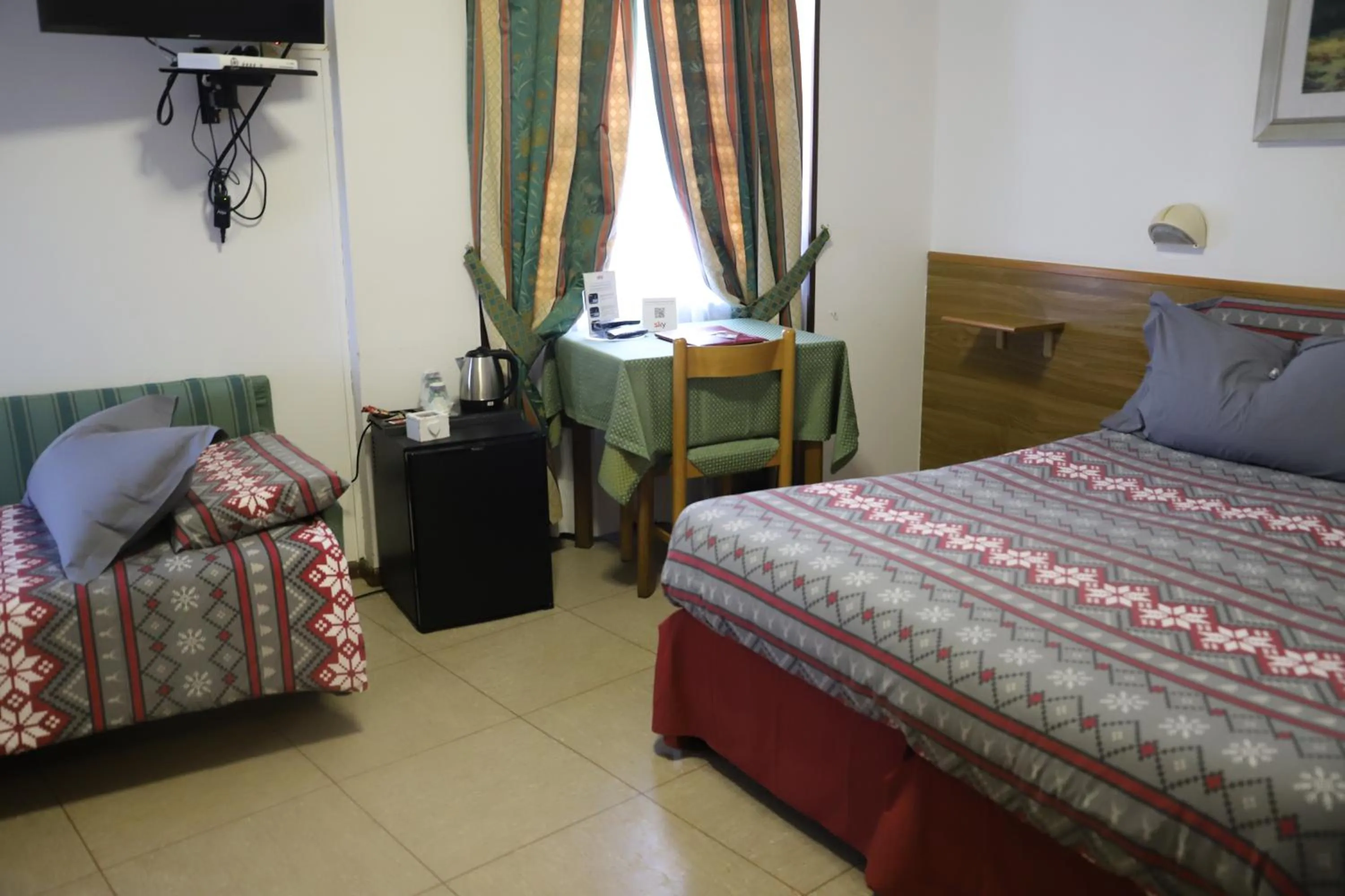 Bed in Hotel Bucaneve