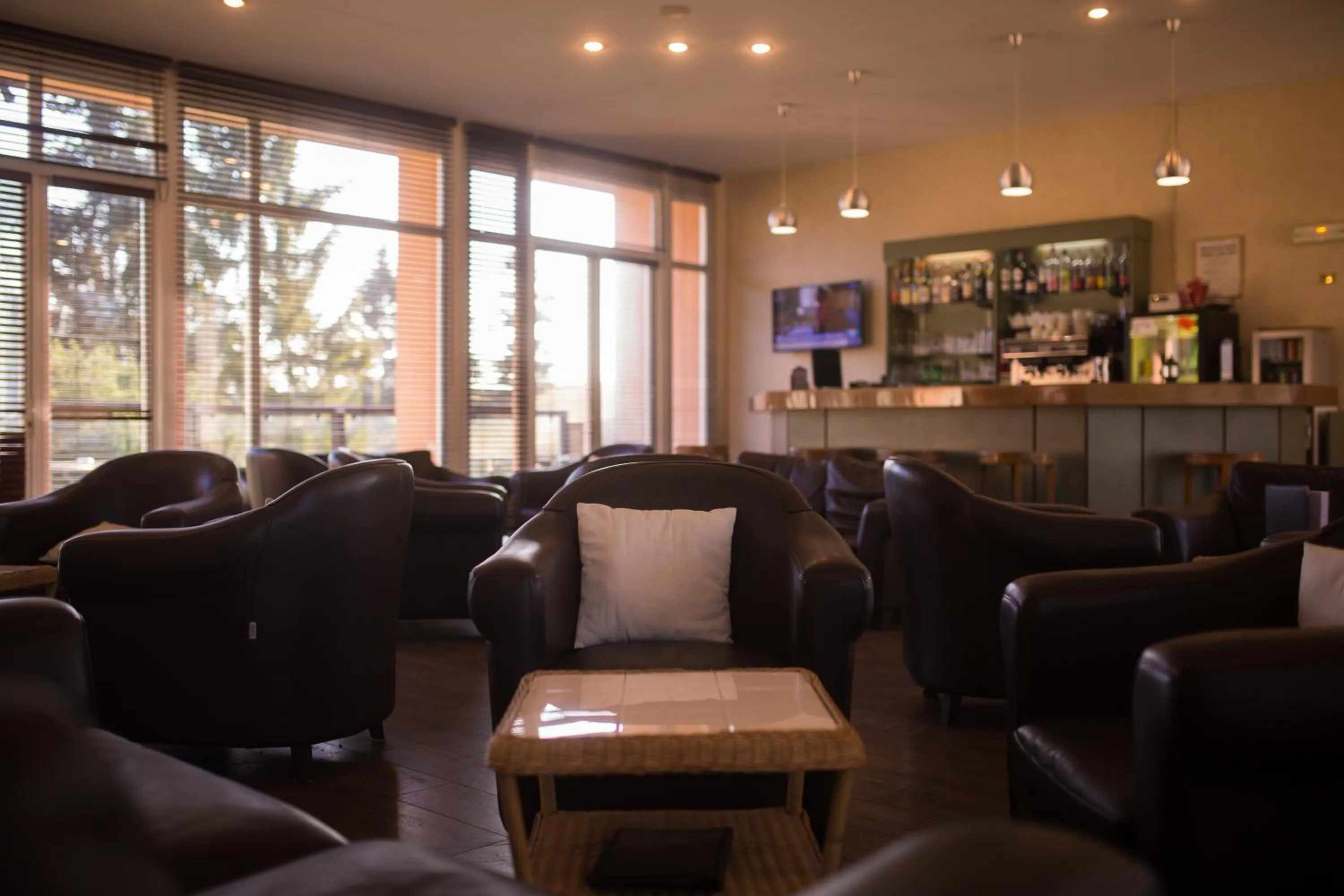 Communal lounge/ TV room in Golf Hotel de Mont Griffon