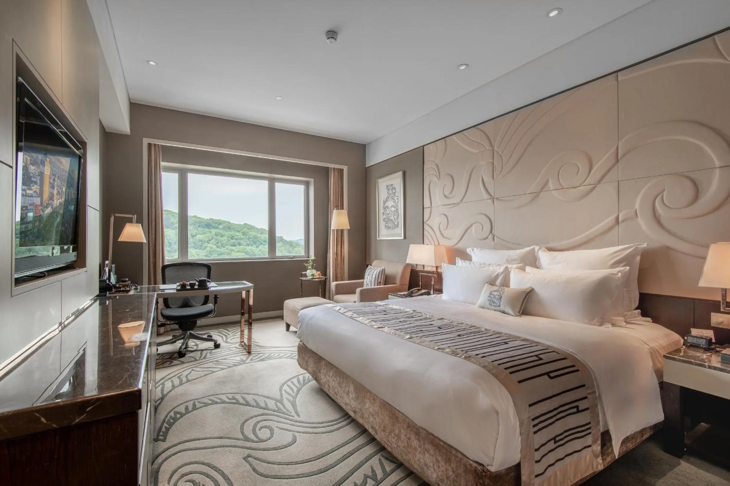Bed in Grand Pacific Hotel Ningbo