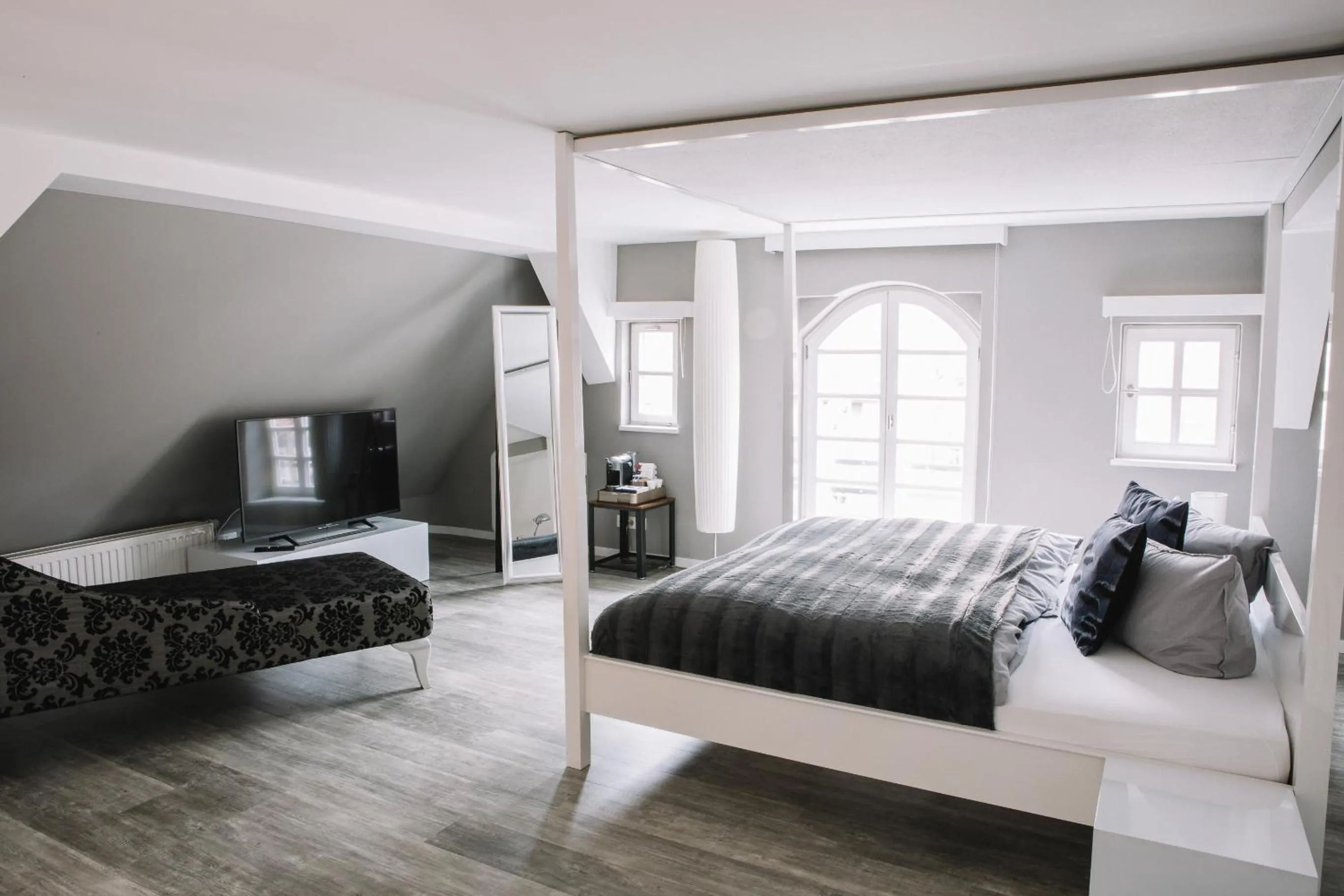 Photo of the whole room, Bed in Boutique Hotel Pfauen