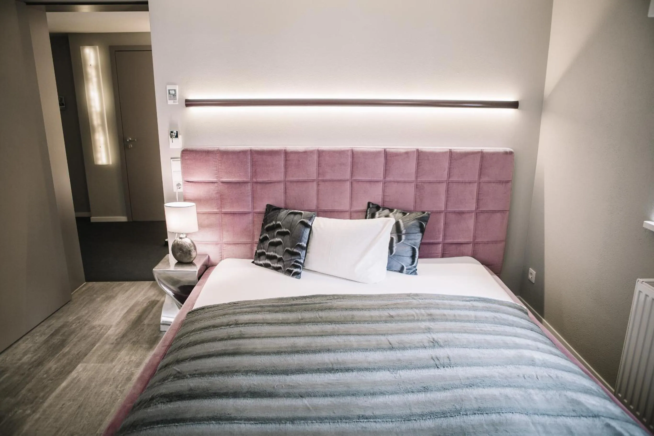 Bed in Boutique Hotel Pfauen