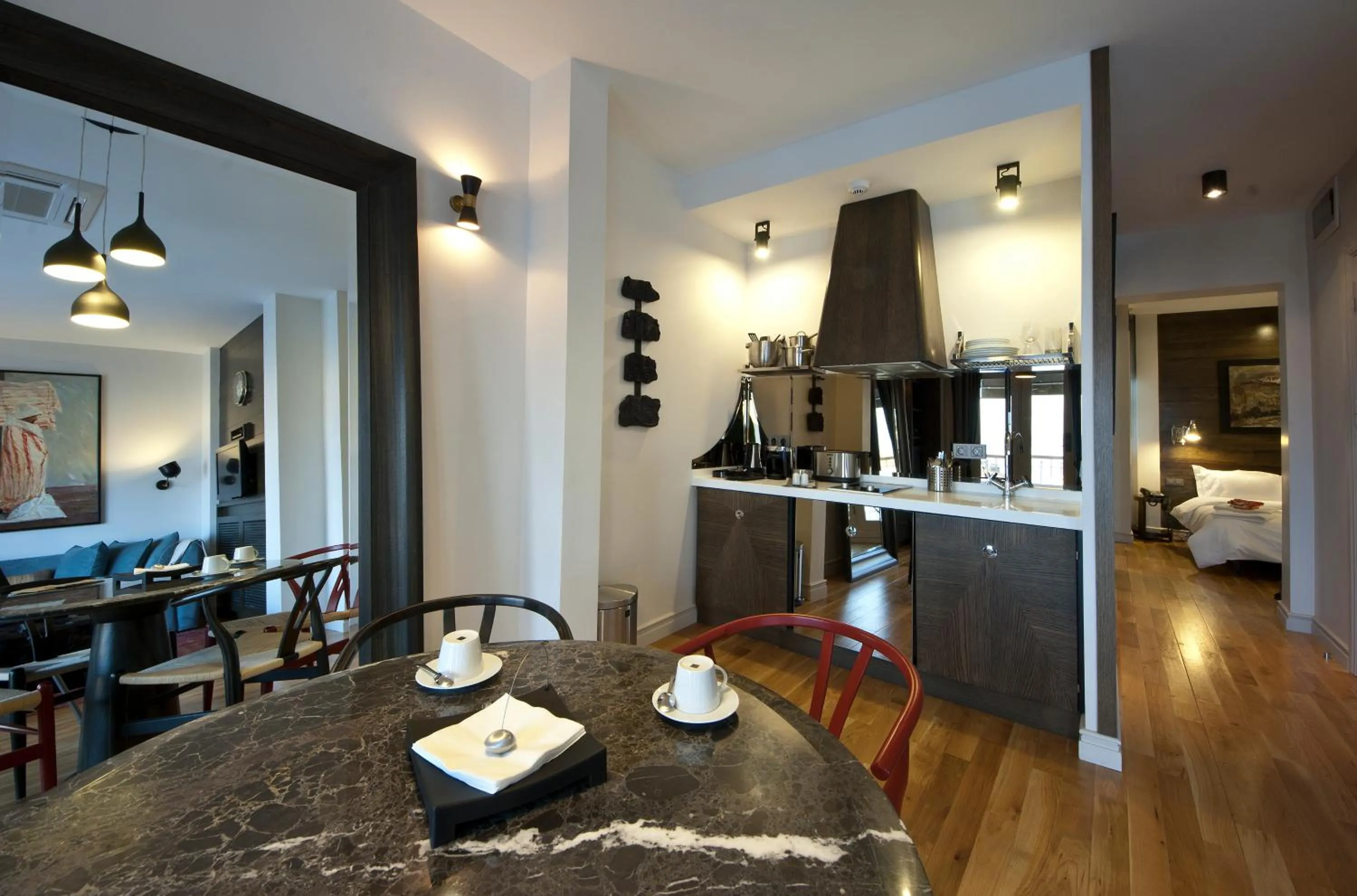 Kitchen or kitchenette, Bed in Urban Suites