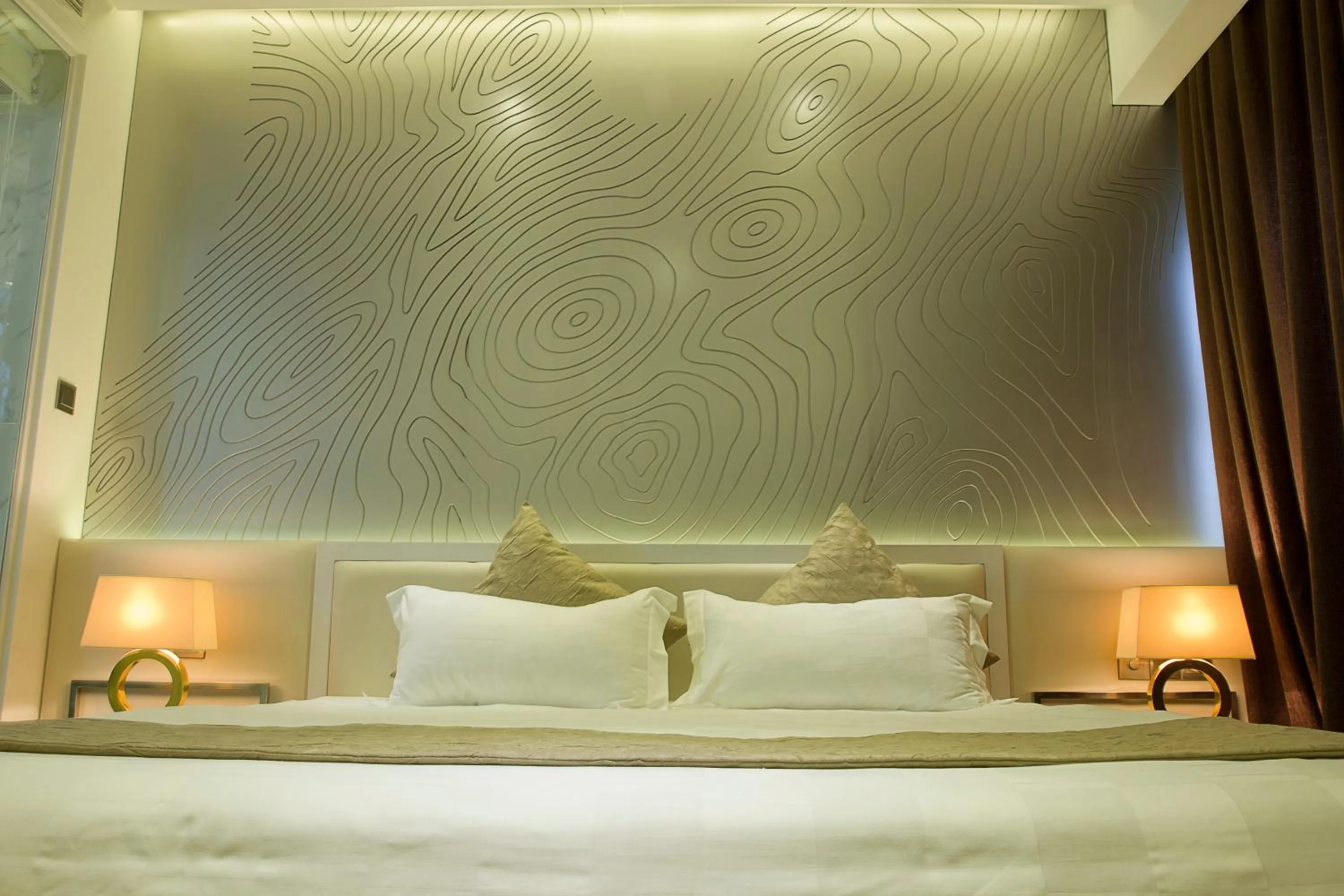 Bed in Signature Boutique Hotel