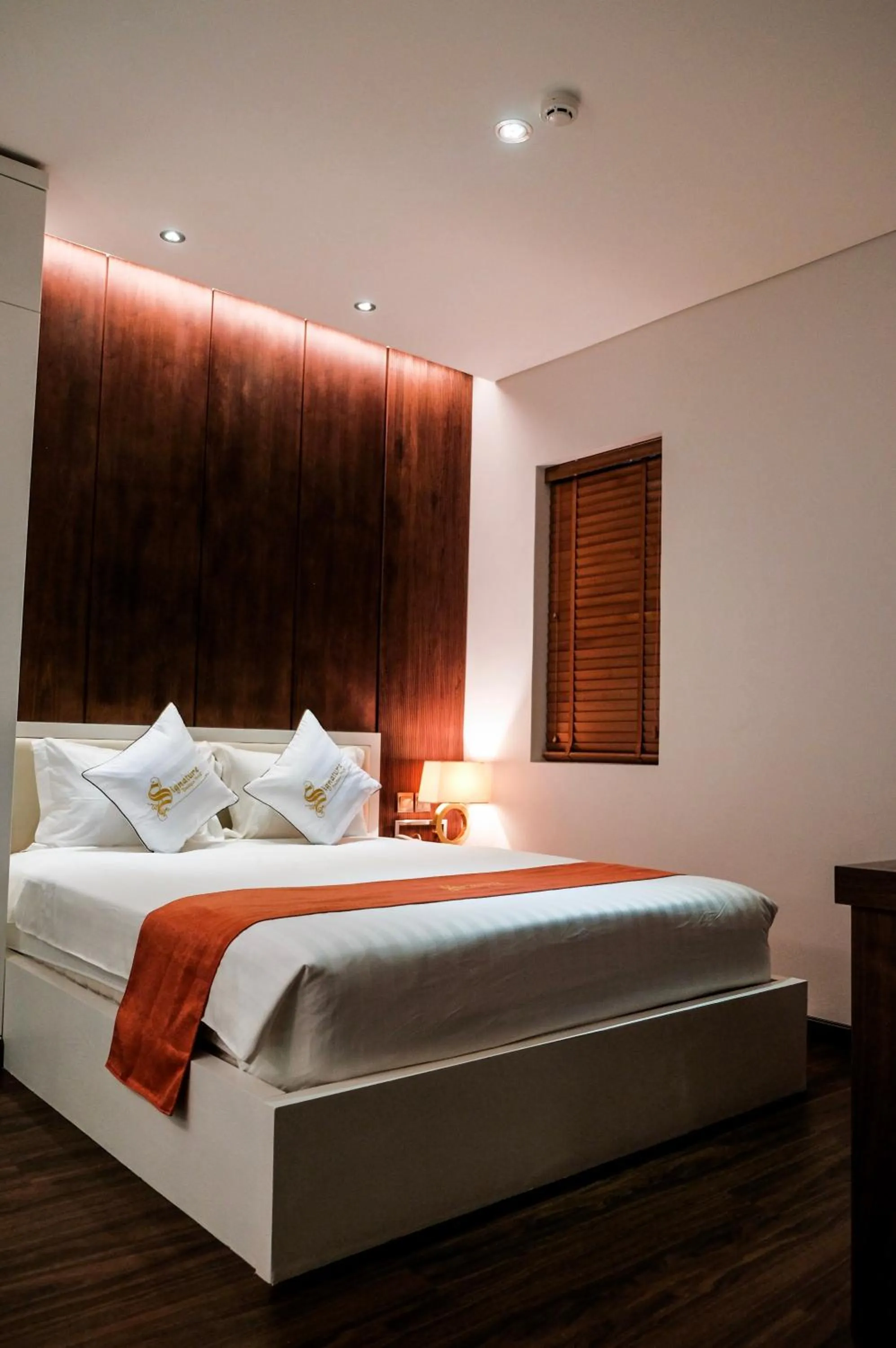 Bed in Signature Boutique Hotel