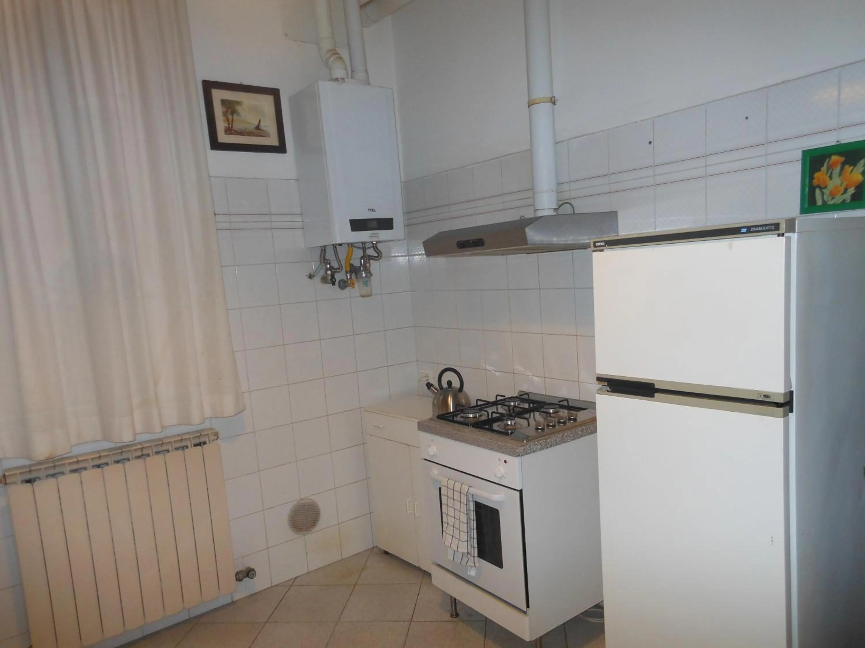 Kitchen or kitchenette in Appartamenti del Dose