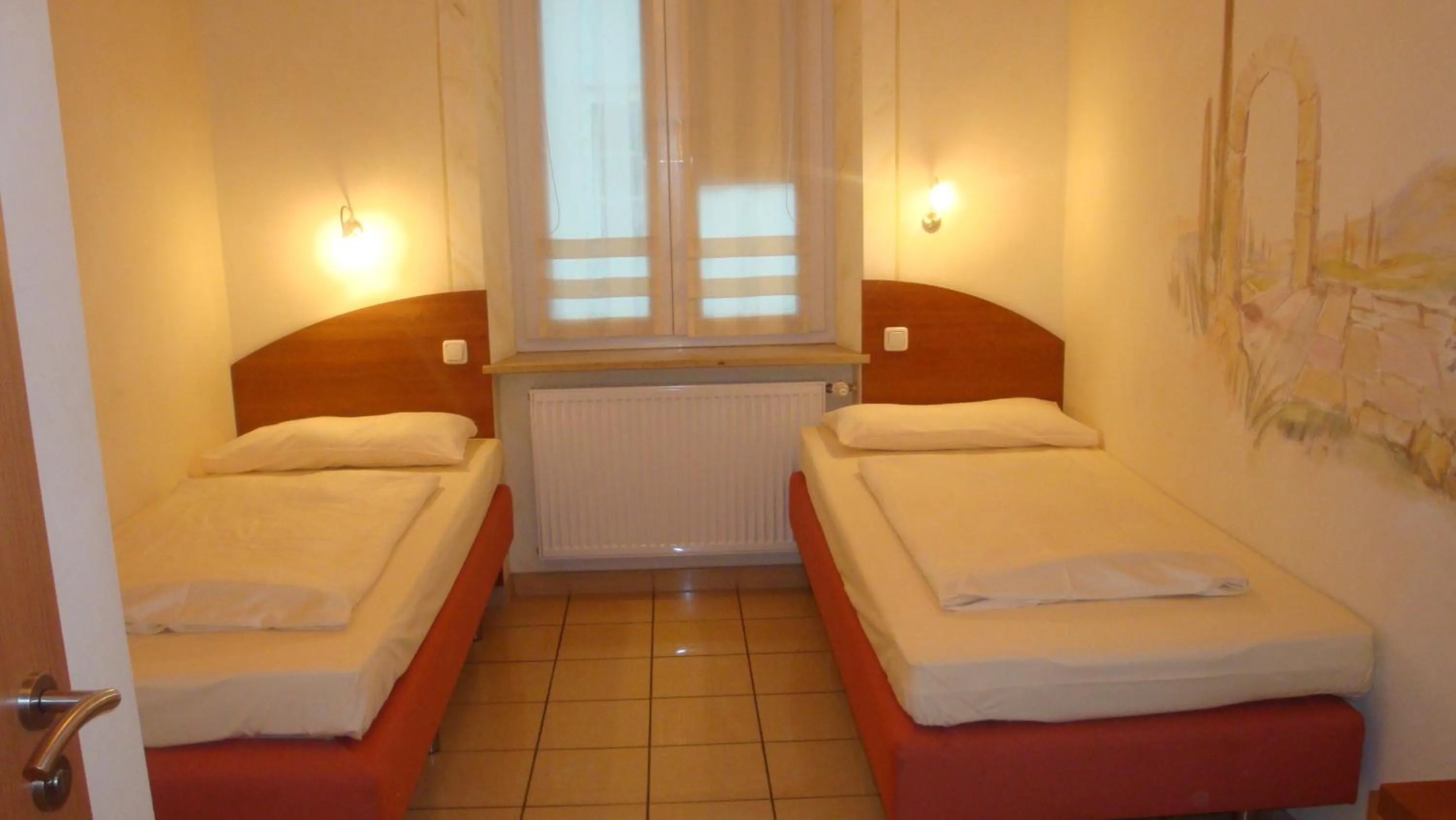 Photo of the whole room, Bed in StadtHotel Passau