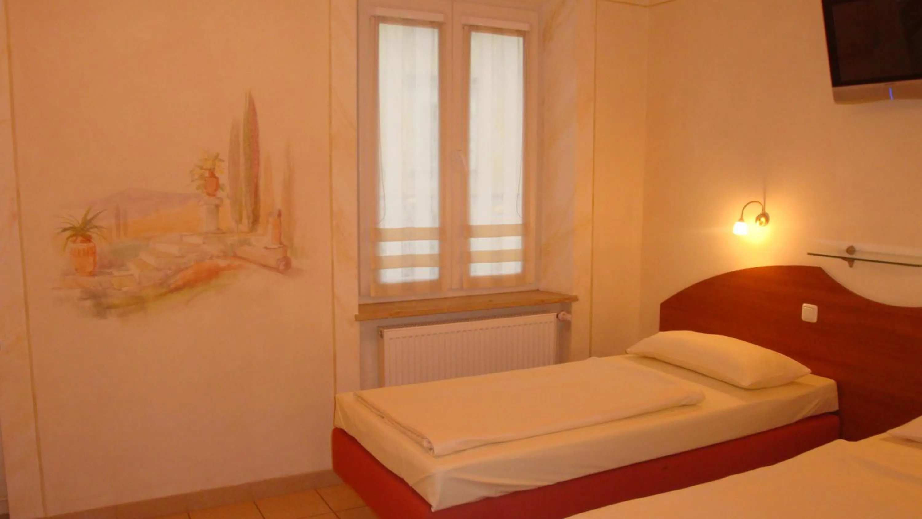 Photo of the whole room, Bed in StadtHotel Passau