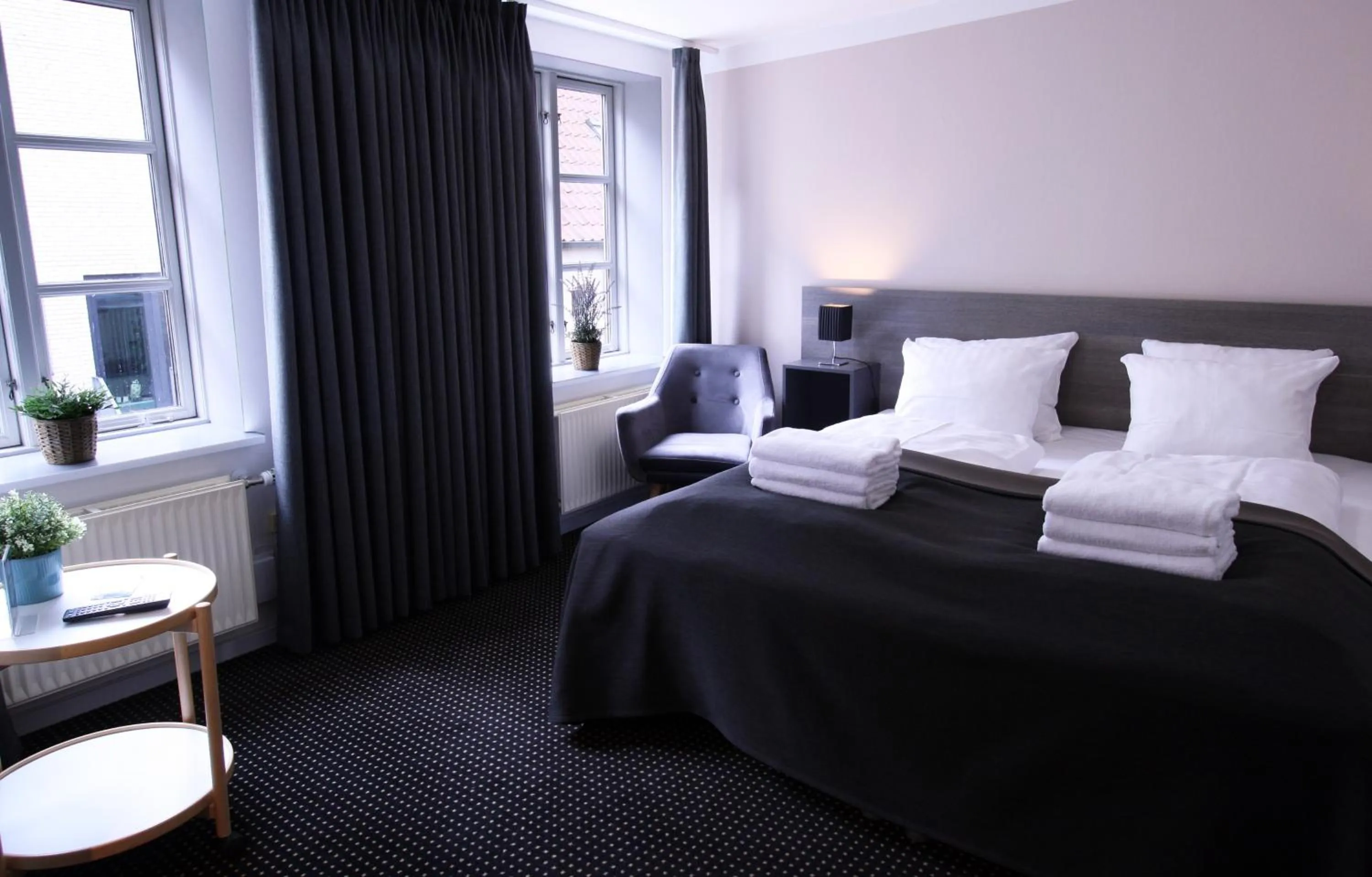 Bed in Hotel Aarhus City Apartments