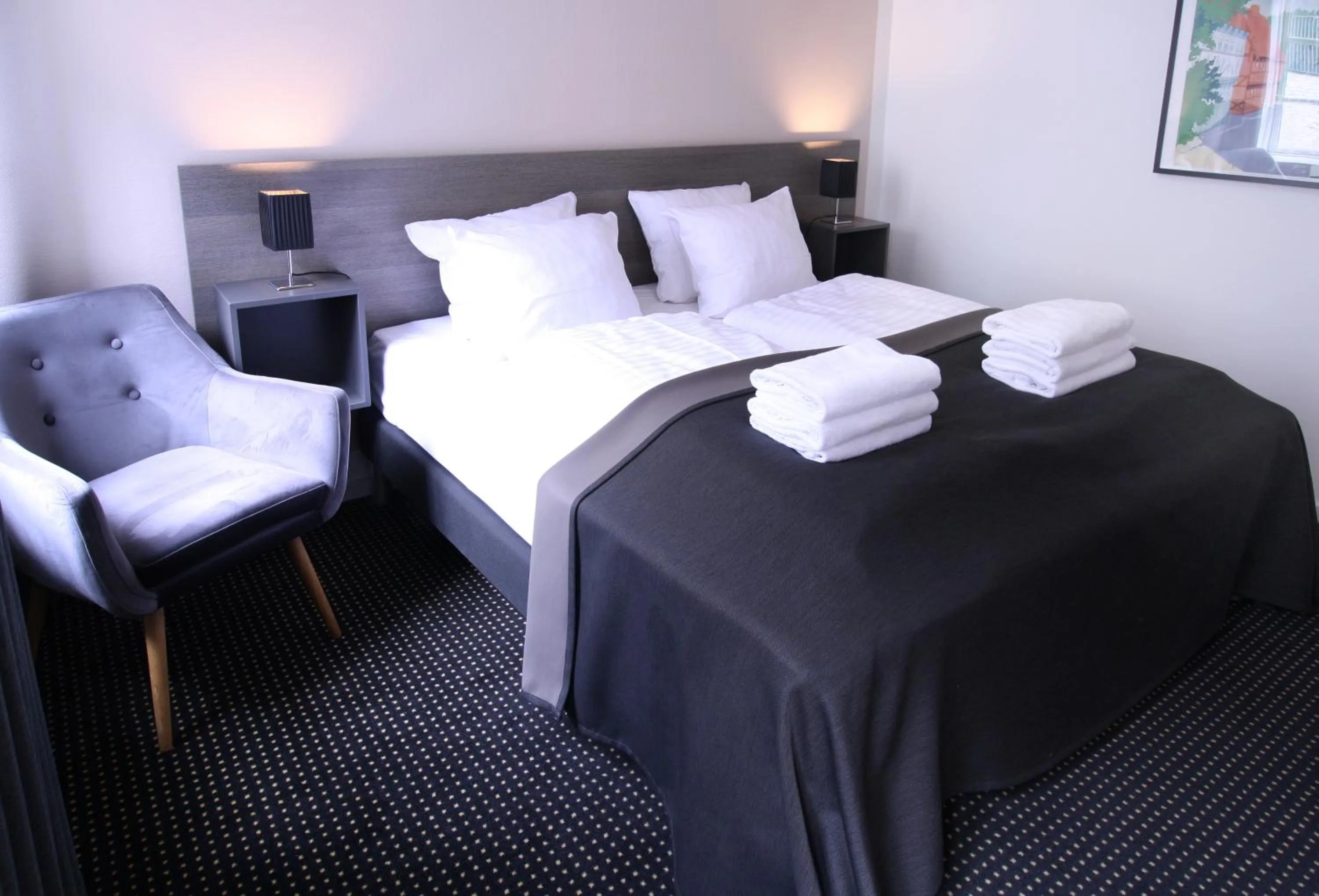 Bed in Hotel Aarhus City Apartments