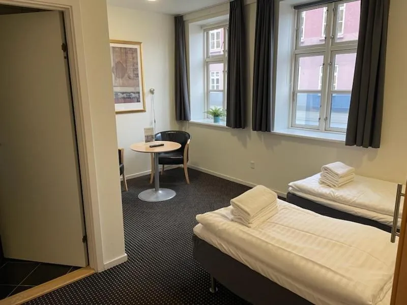 Bed in Hotel Aarhus City Apartments