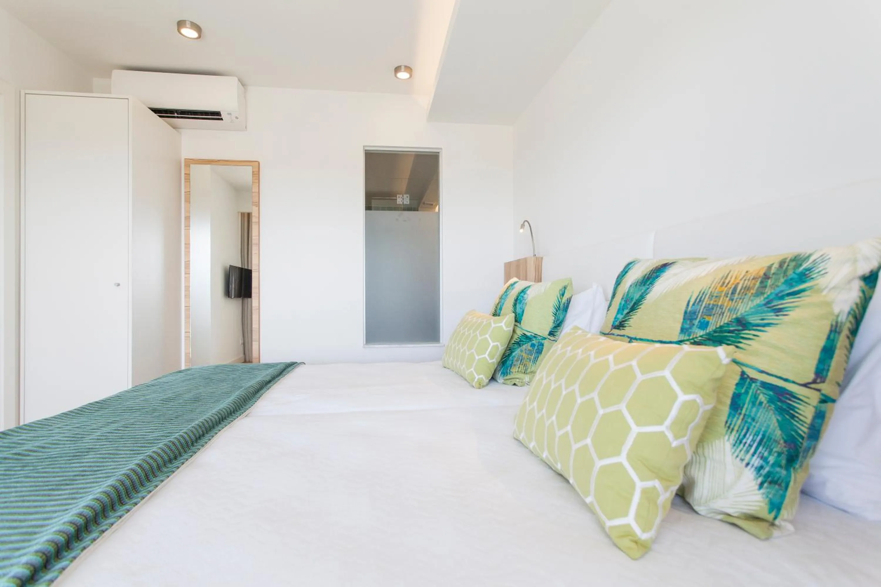 Bed in Alfagar Aparthotel