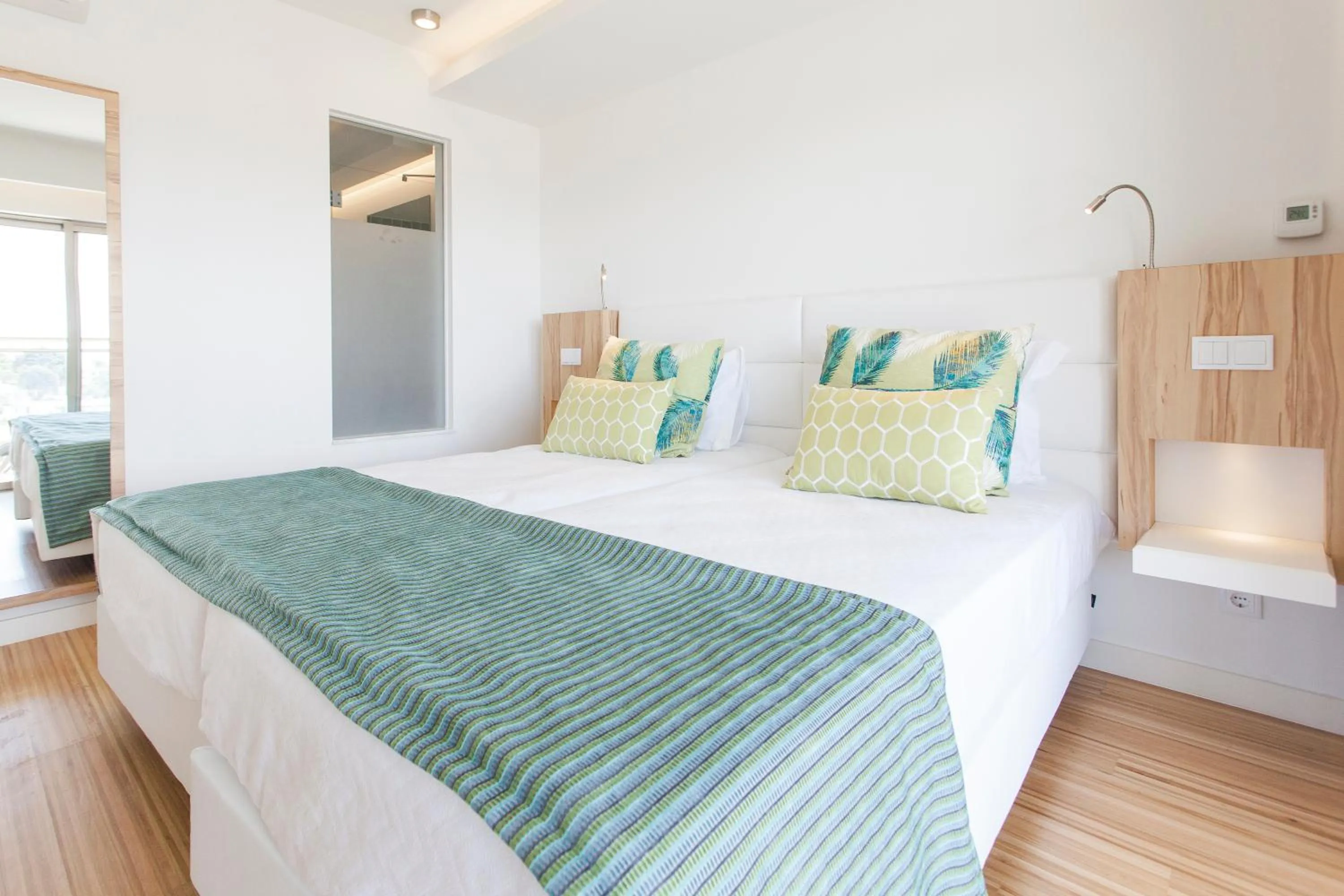 Bed in Alfagar Aparthotel