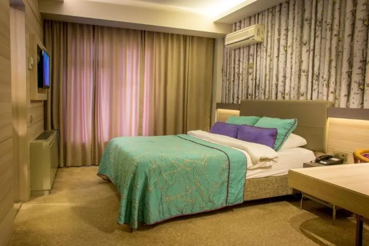 Photo of the whole room, Bed in Asya Hotel