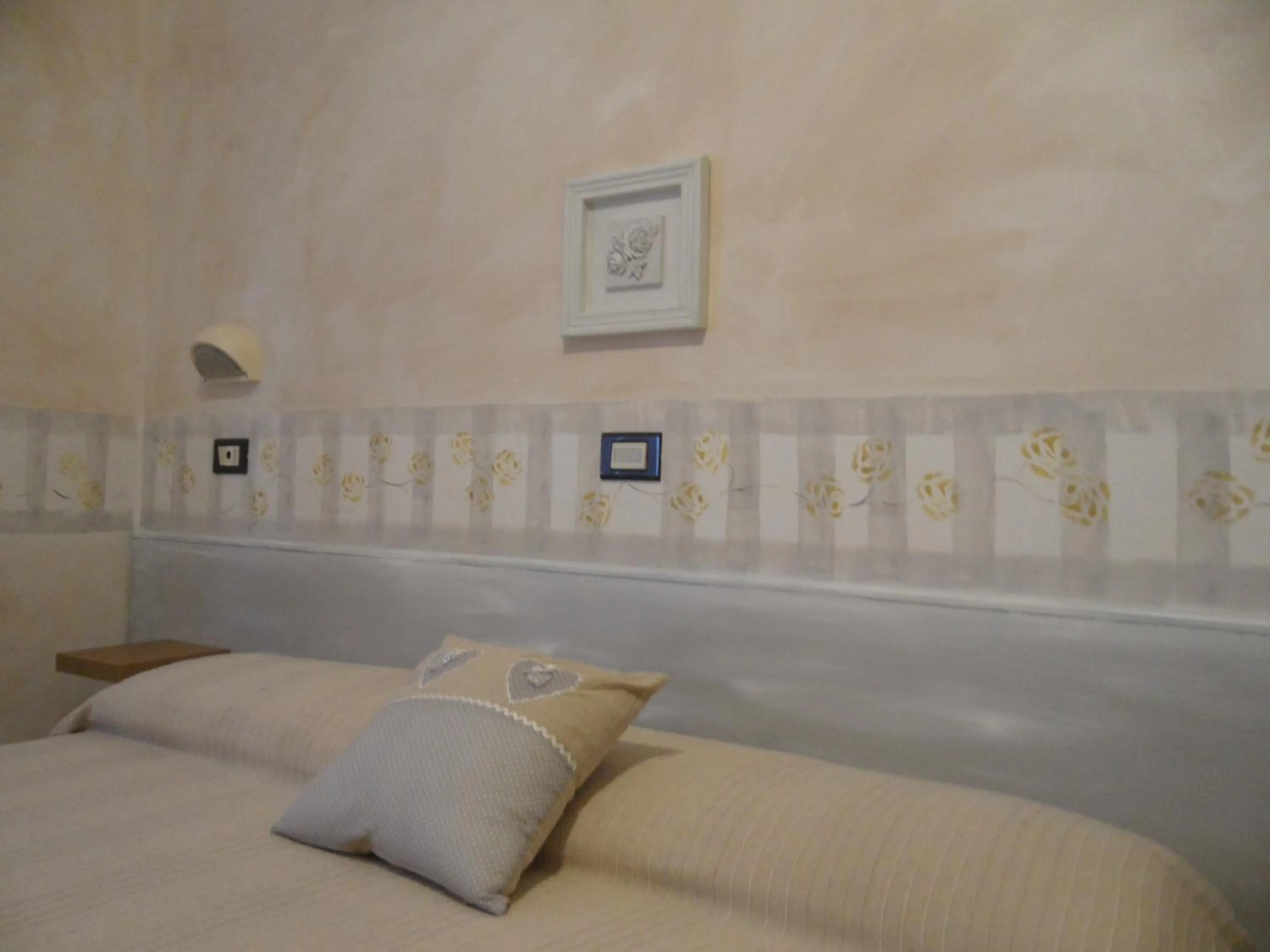 Decorative detail, Bed in L'Antico Borgo Elena Noli