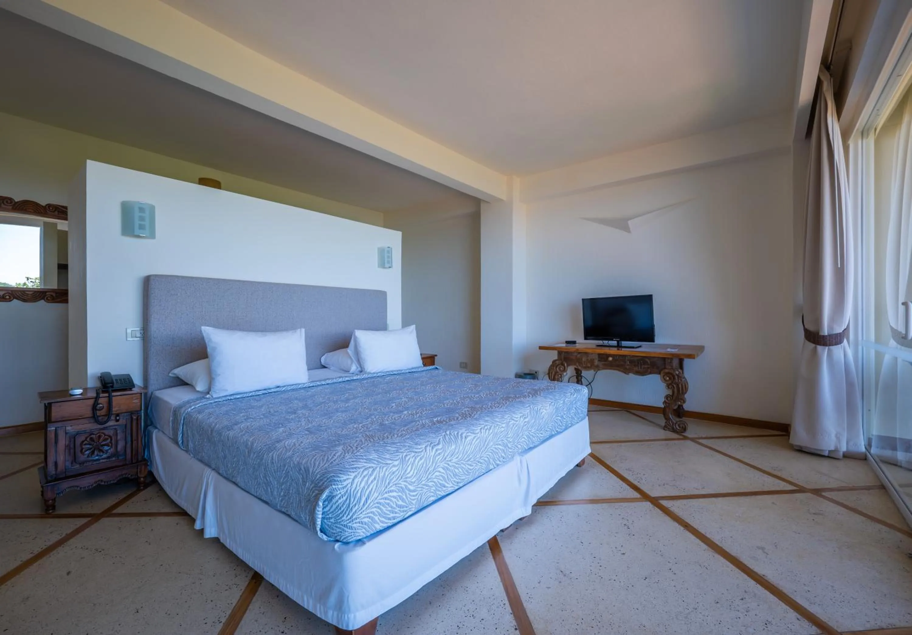 Bed in Hotel La Mariposa