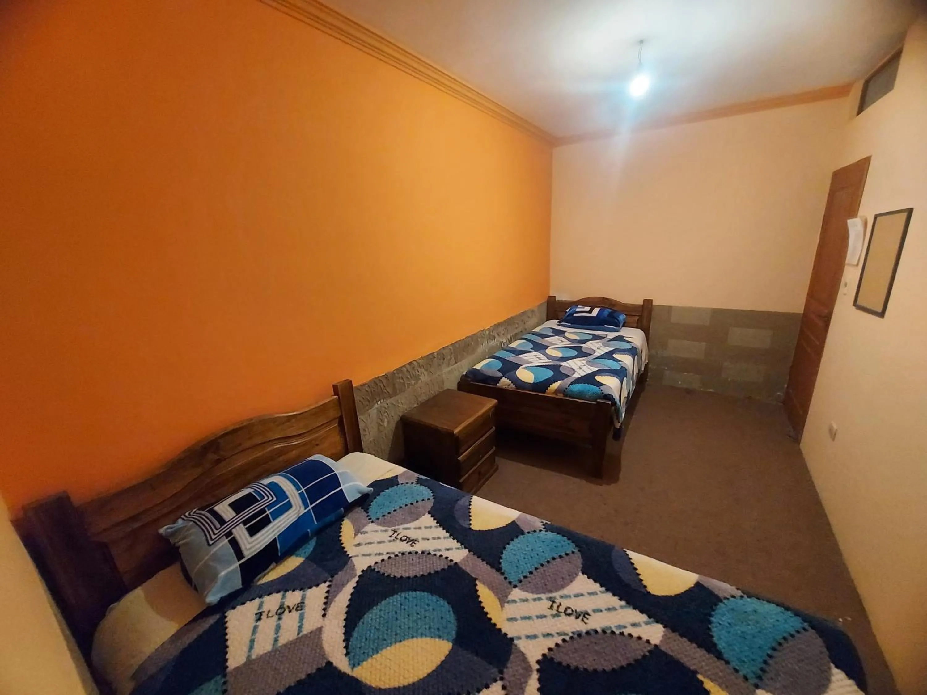 Double Room with Shared Bathroom - single occupancy in Ñaupa House Hostel