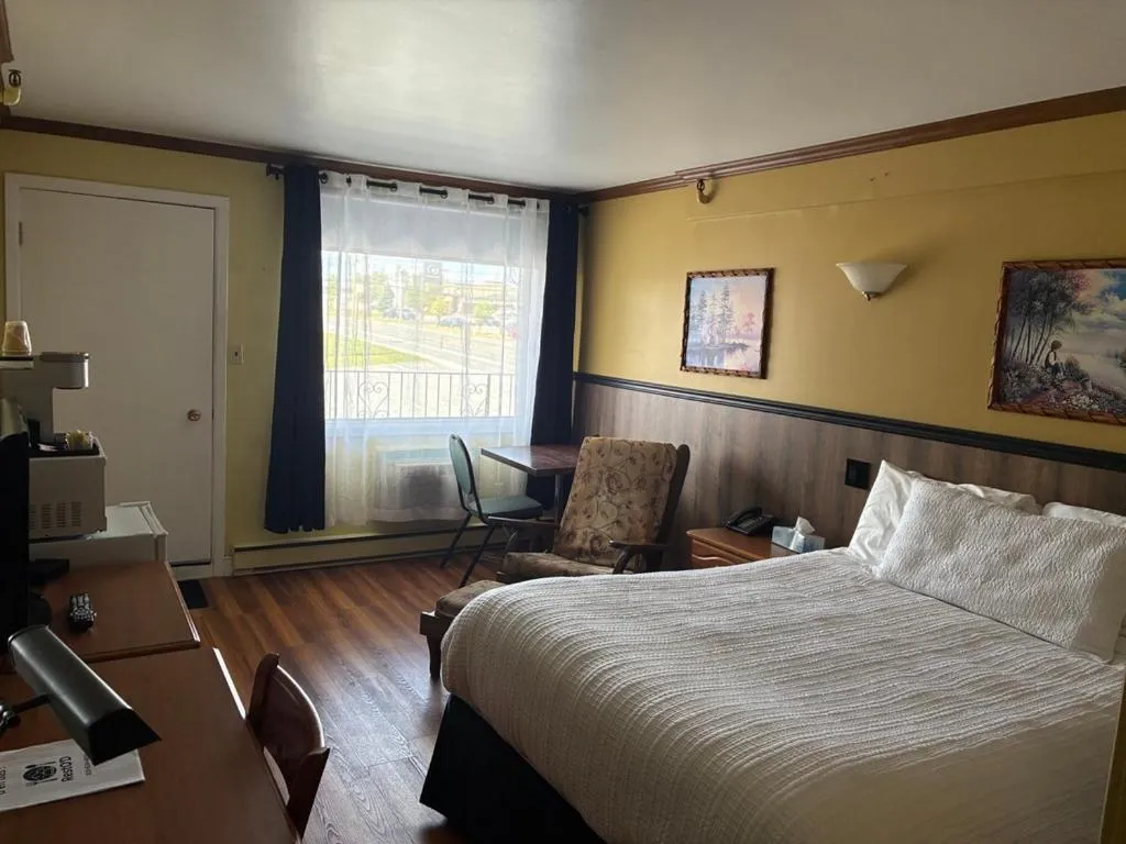 Bed in Hotel Motel Le Château