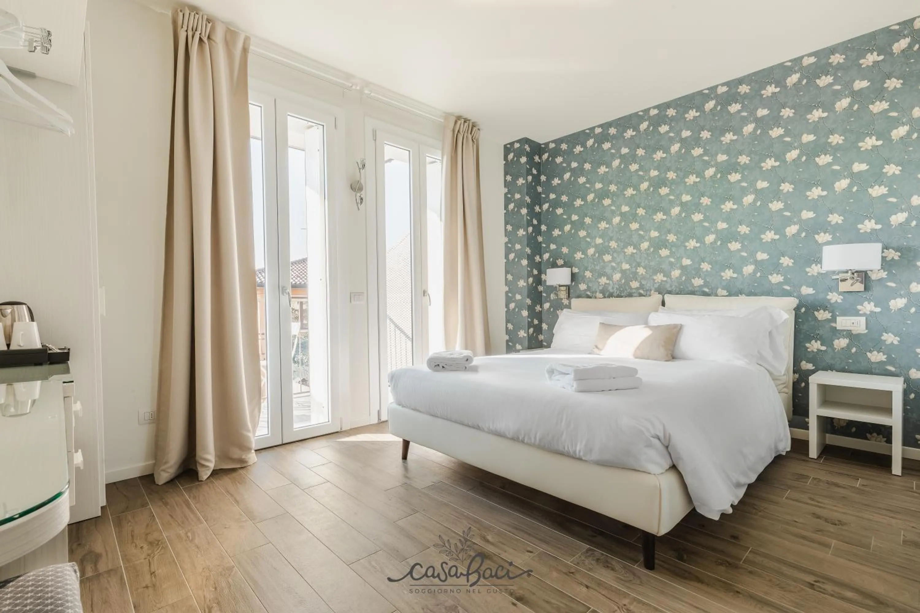 Photo of the whole room, Bed in CASA BACI - Soggiorno nel Gusto