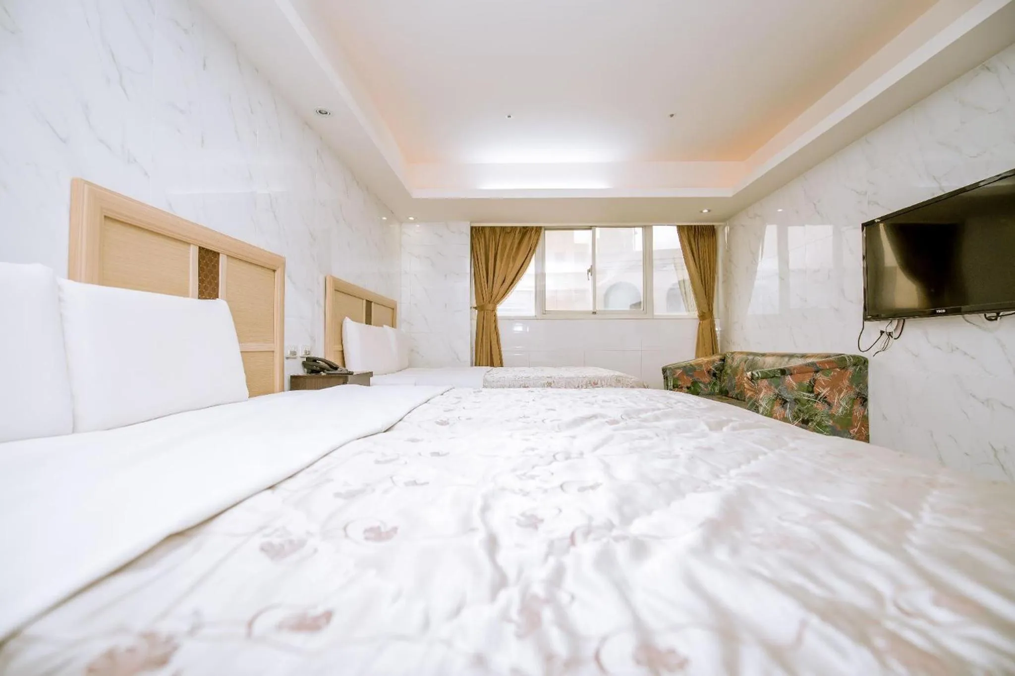 Bed in Guide Hotel Taoyuan Fuxing