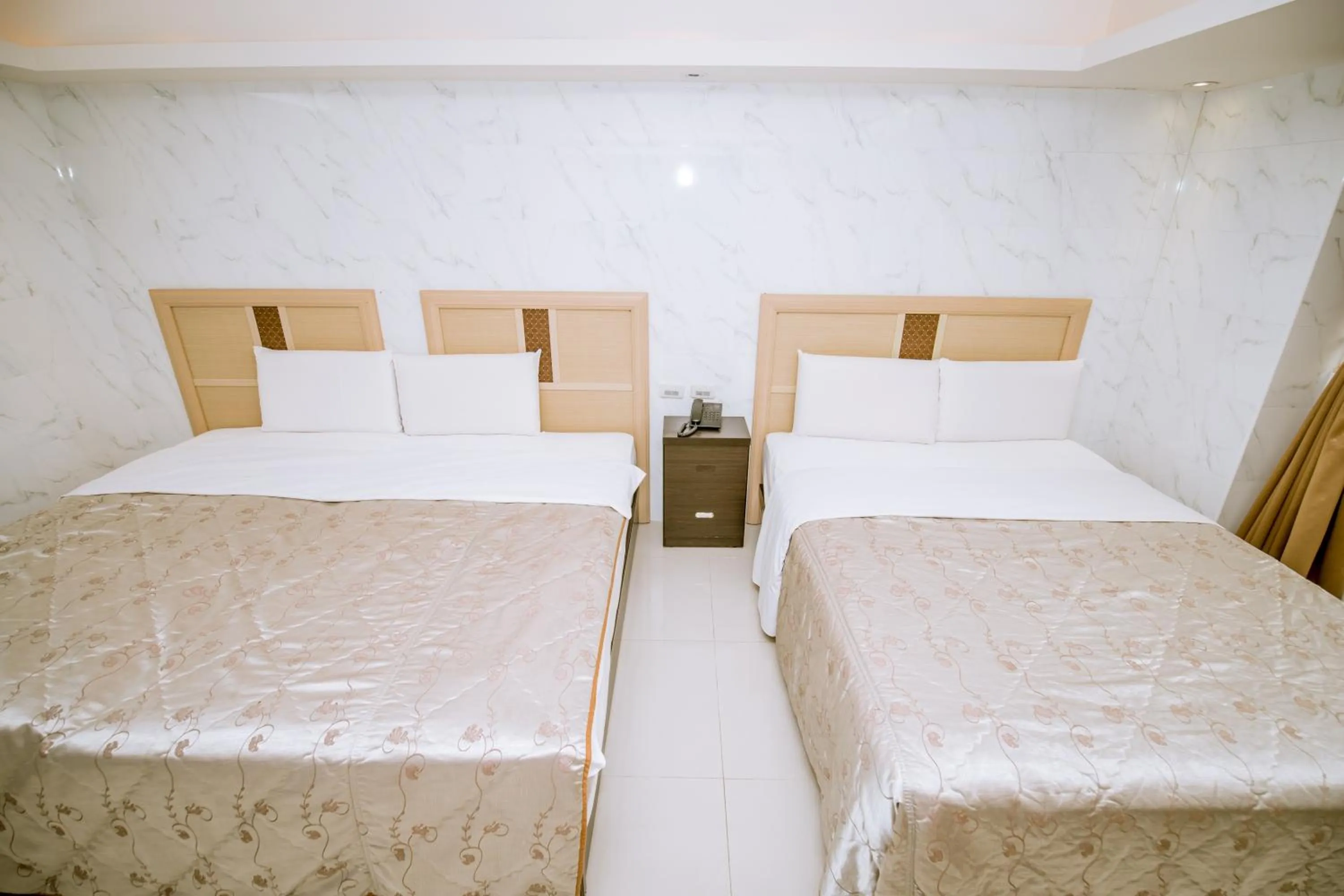 Bed in Guide Hotel Taoyuan Fuxing