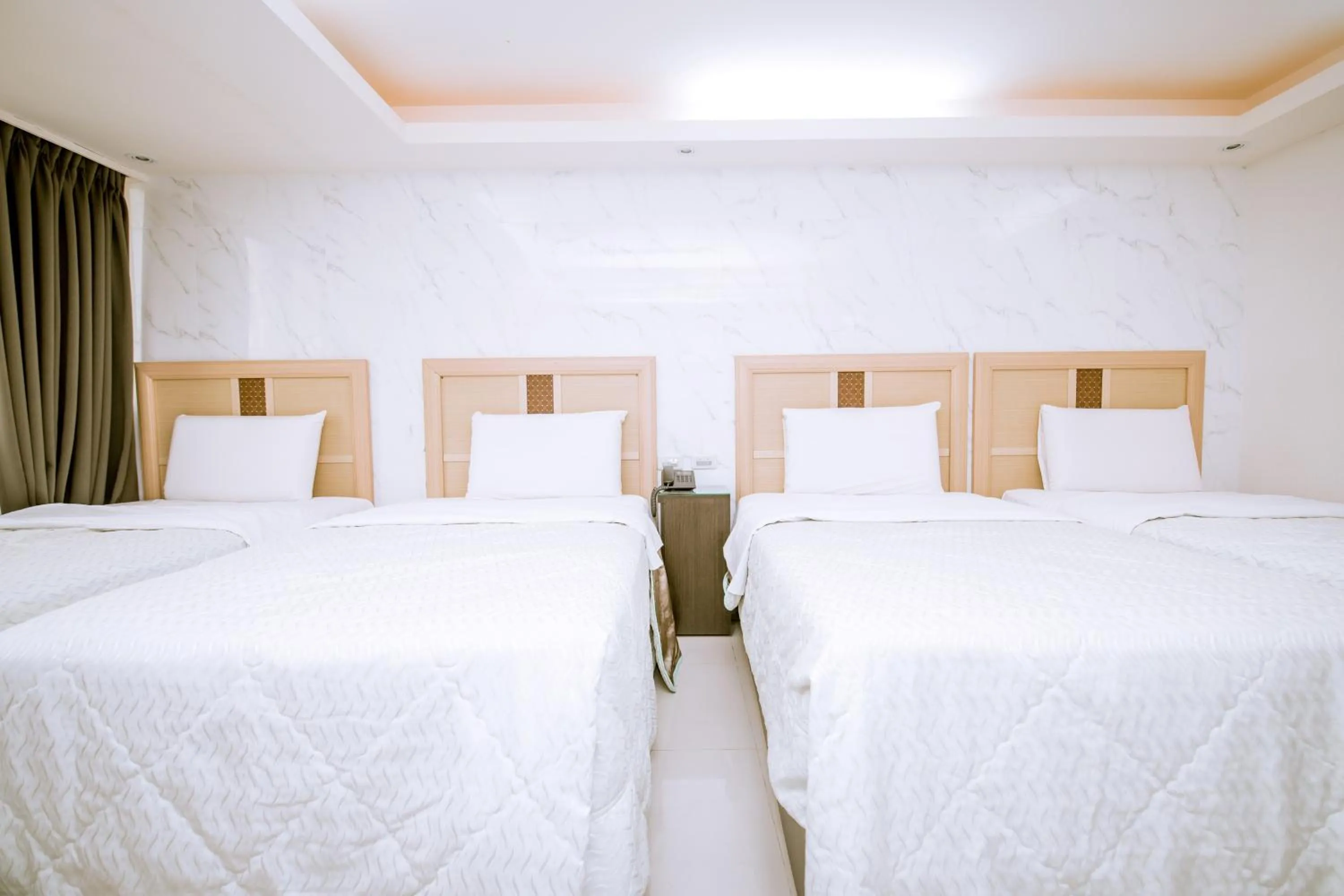 Bed in Guide Hotel Taoyuan Fuxing