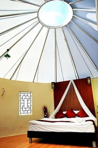 Bed in The Natural Yurt Resort @ Khao Kho