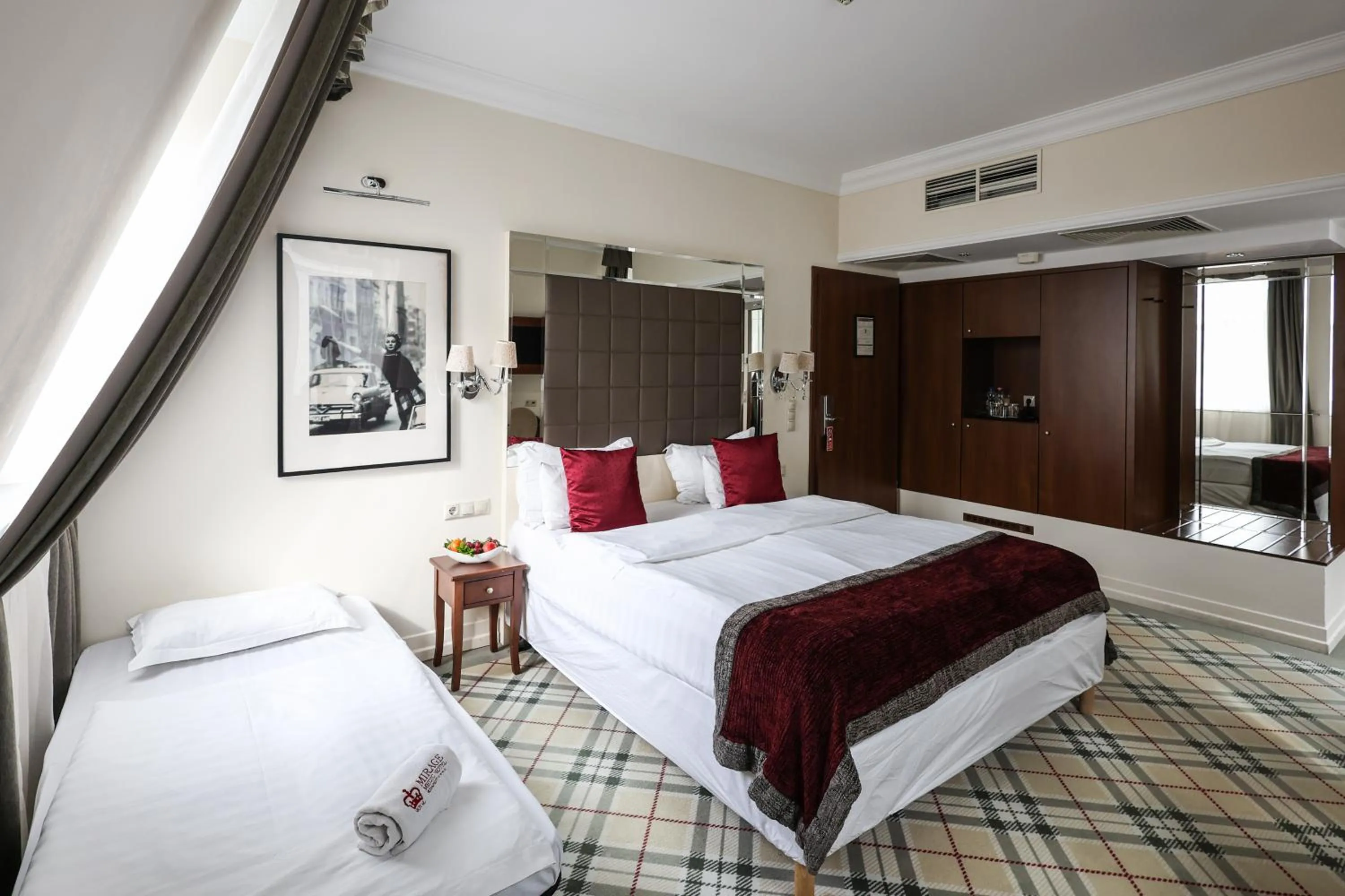 Bed in Mirage Medic Hotel