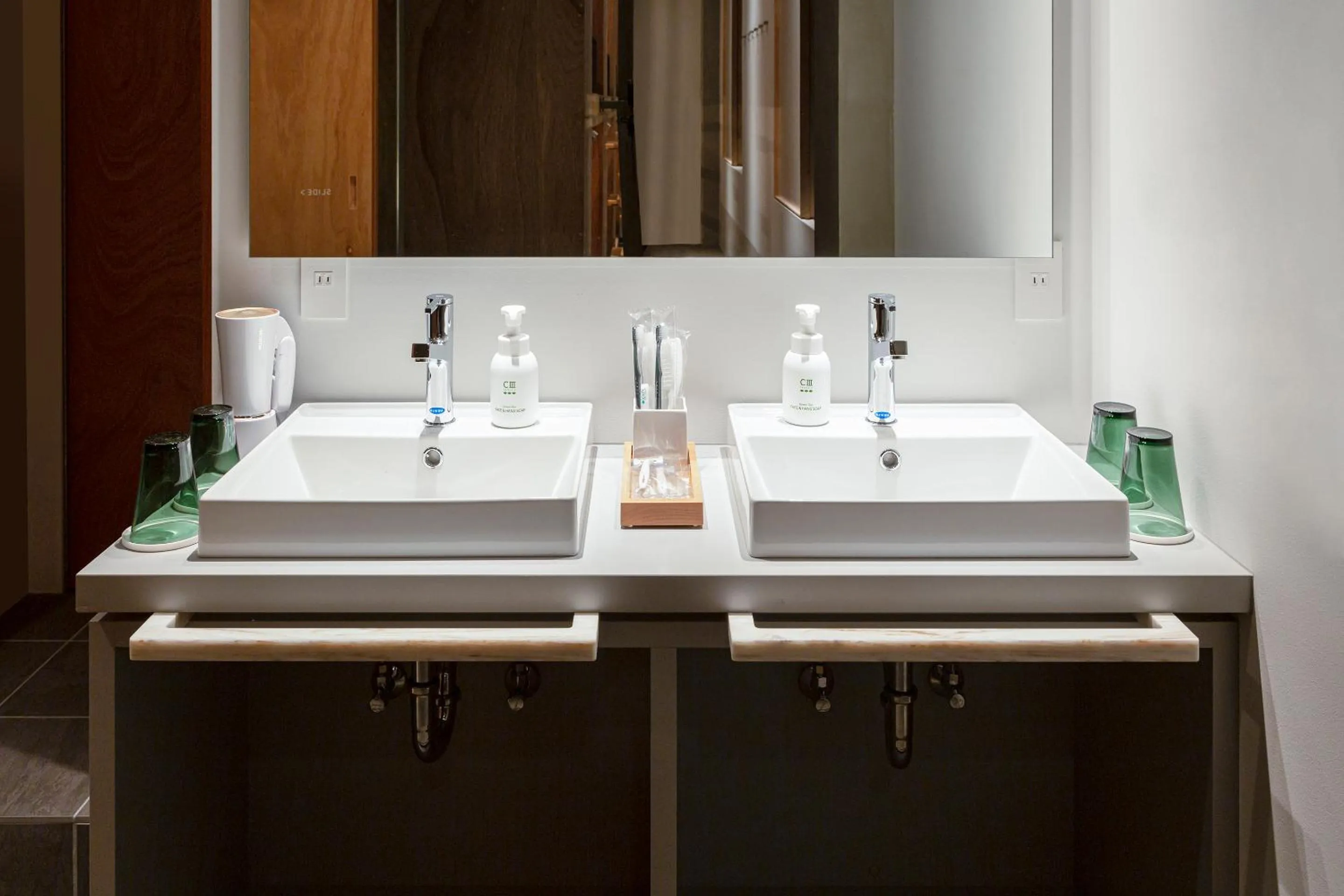 Bathroom in TSUGU Kyoto Sanjo by THE SHARE HOTELS