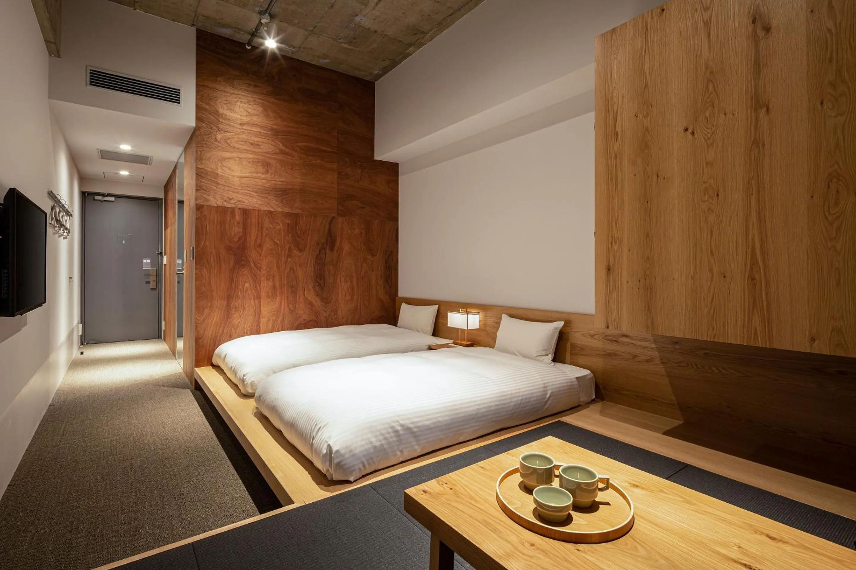 Photo of the whole room, Bed in TSUGU Kyoto Sanjo by THE SHARE HOTELS