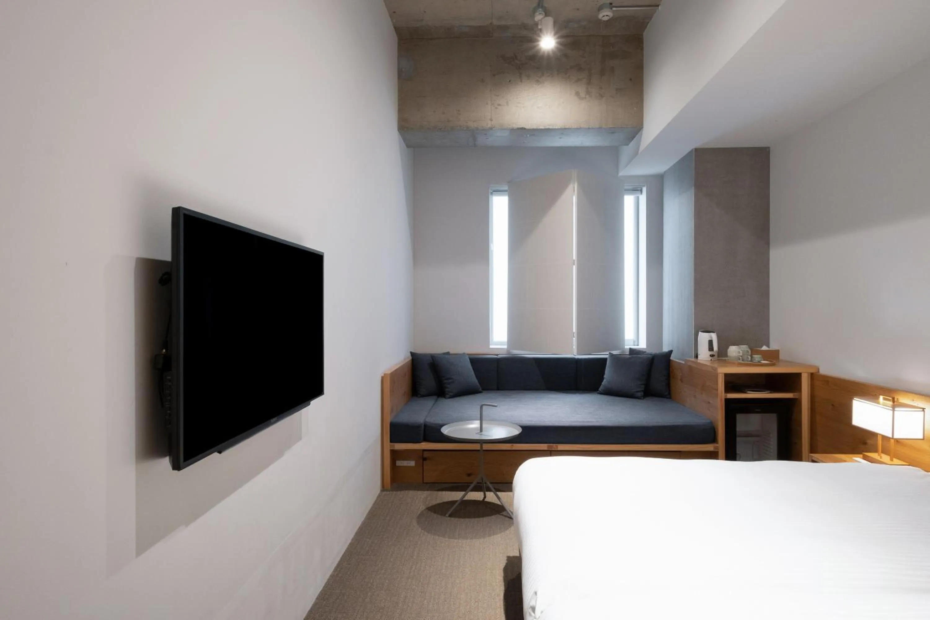 Photo of the whole room, Bed in TSUGU Kyoto Sanjo by THE SHARE HOTELS