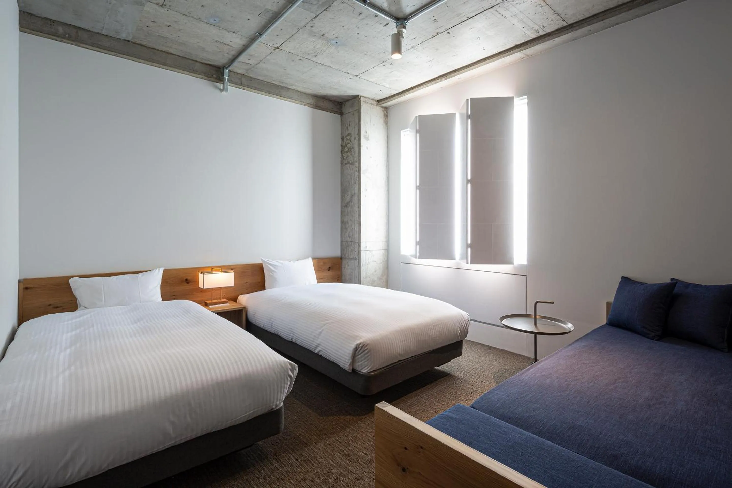 Photo of the whole room, Bed in TSUGU Kyoto Sanjo by THE SHARE HOTELS