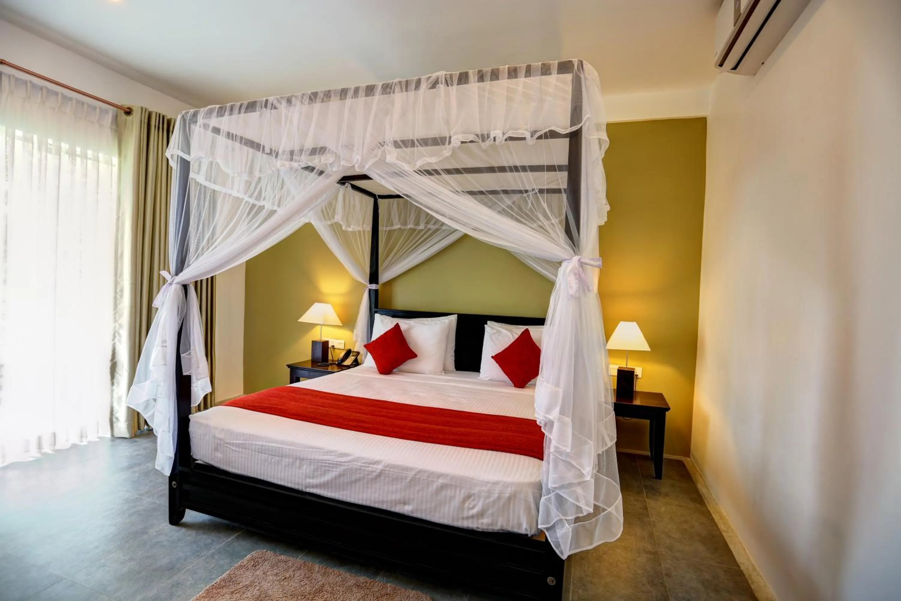 Bed in Tropical Life Resort and Spa