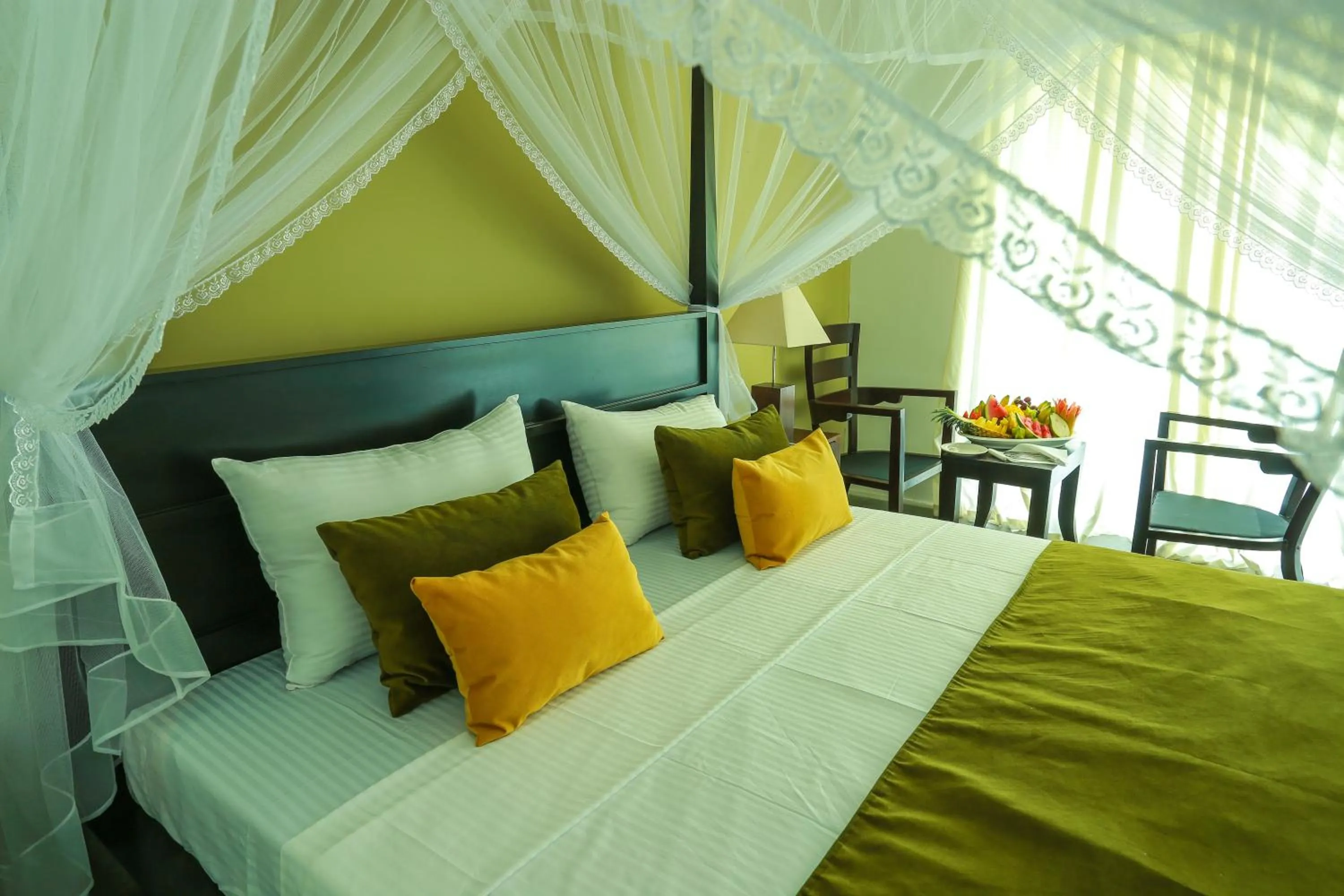 Bed in Tropical Life Resort and Spa