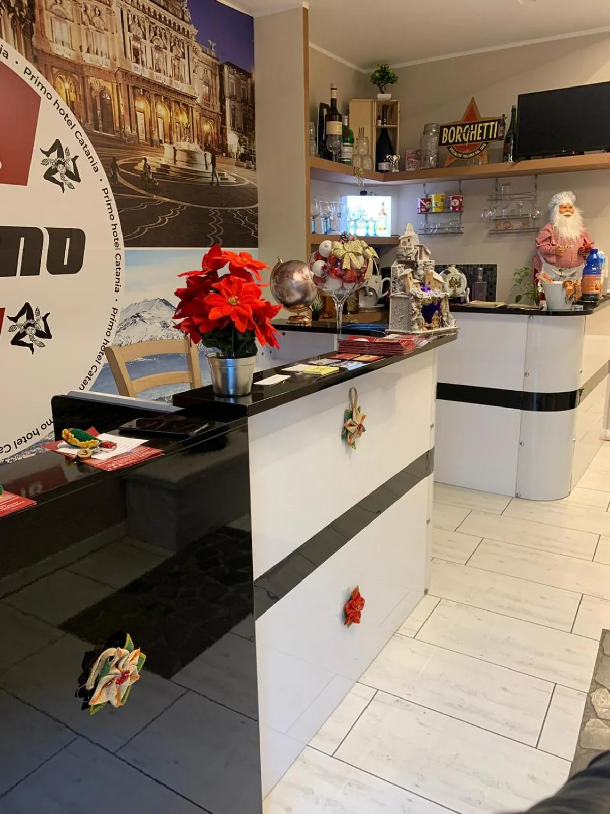 Lobby or reception in Primo Hotel