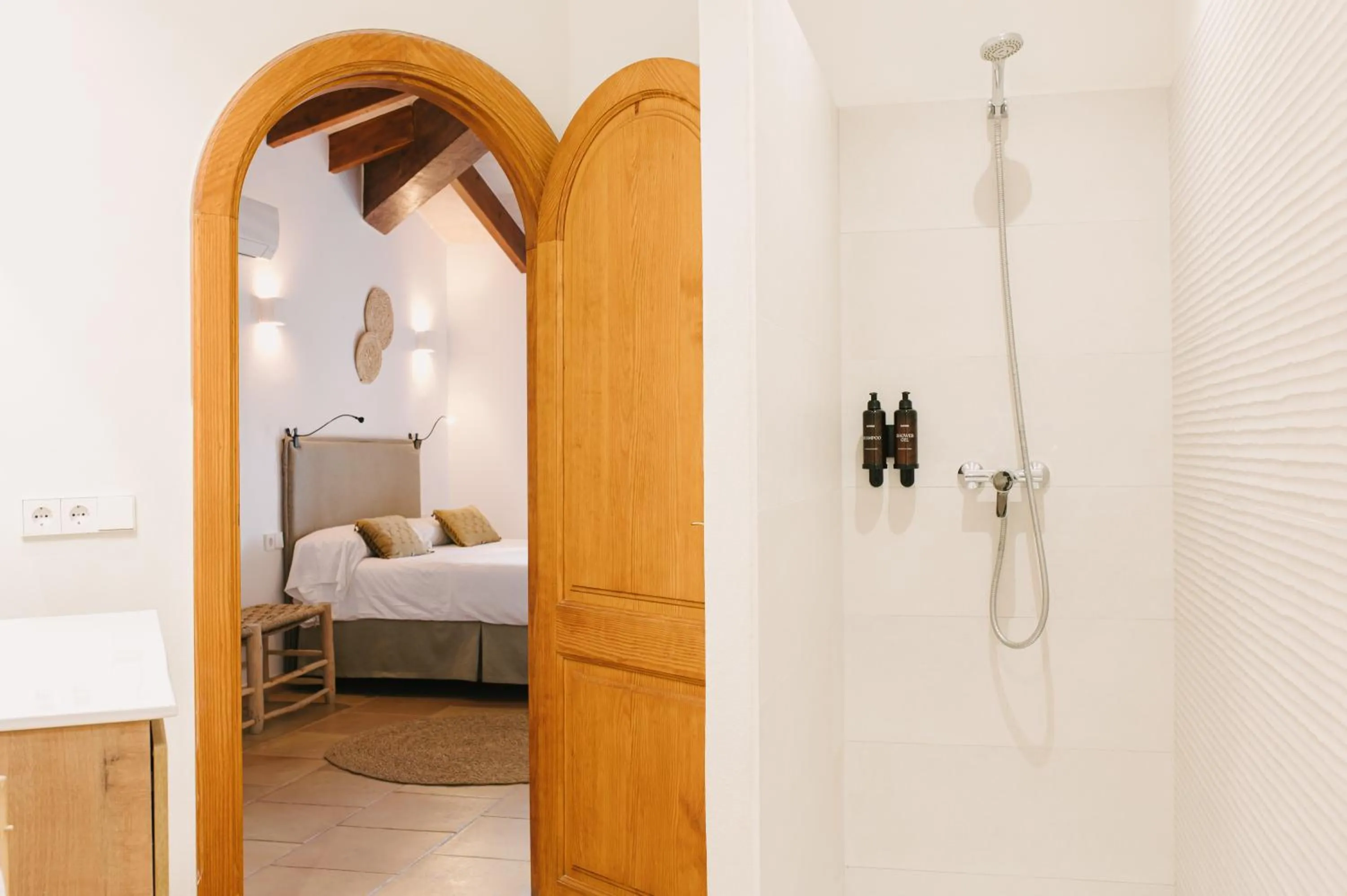 Bed in Curolla Petit Hotel