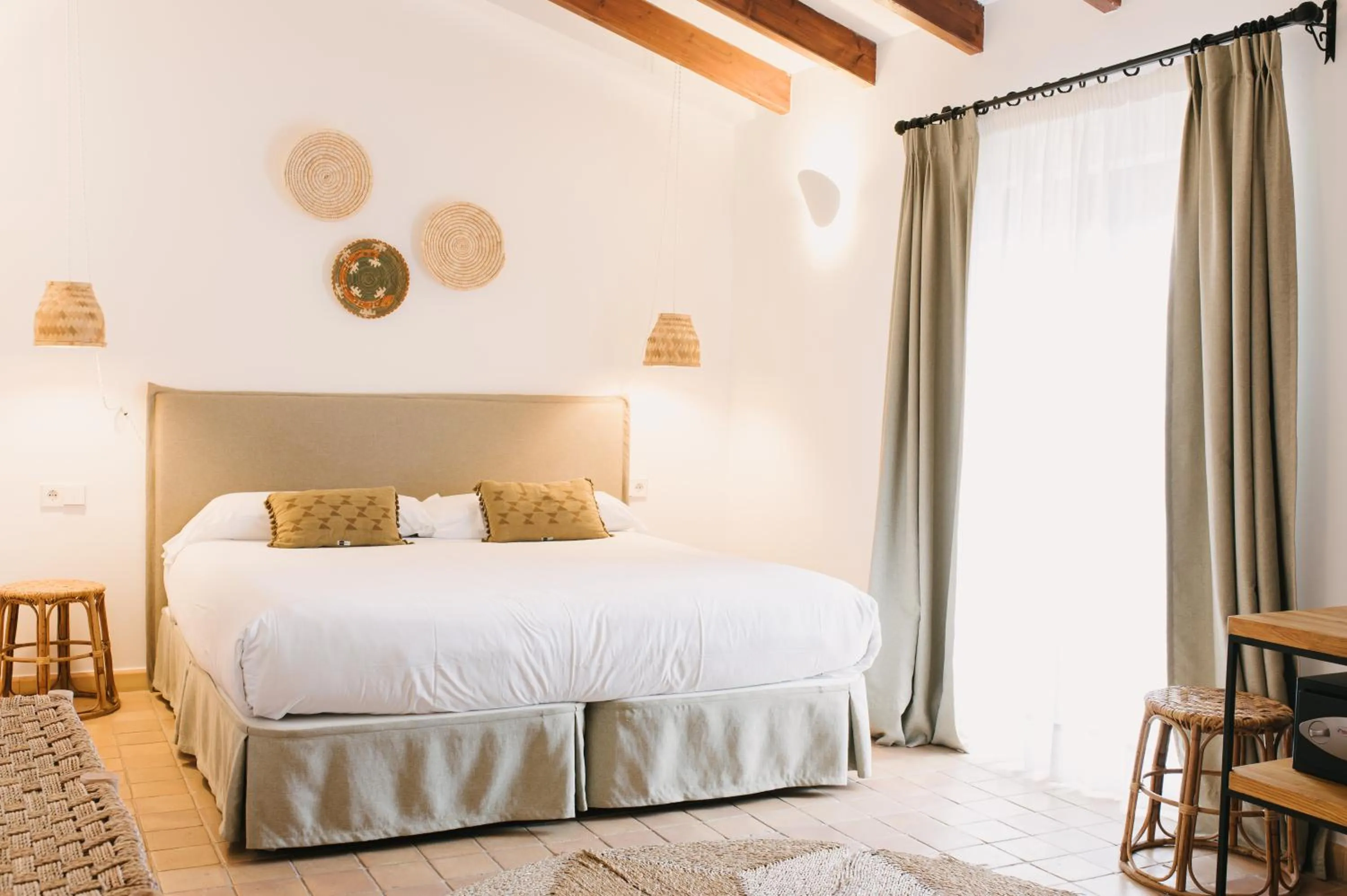 Bed in Curolla Petit Hotel