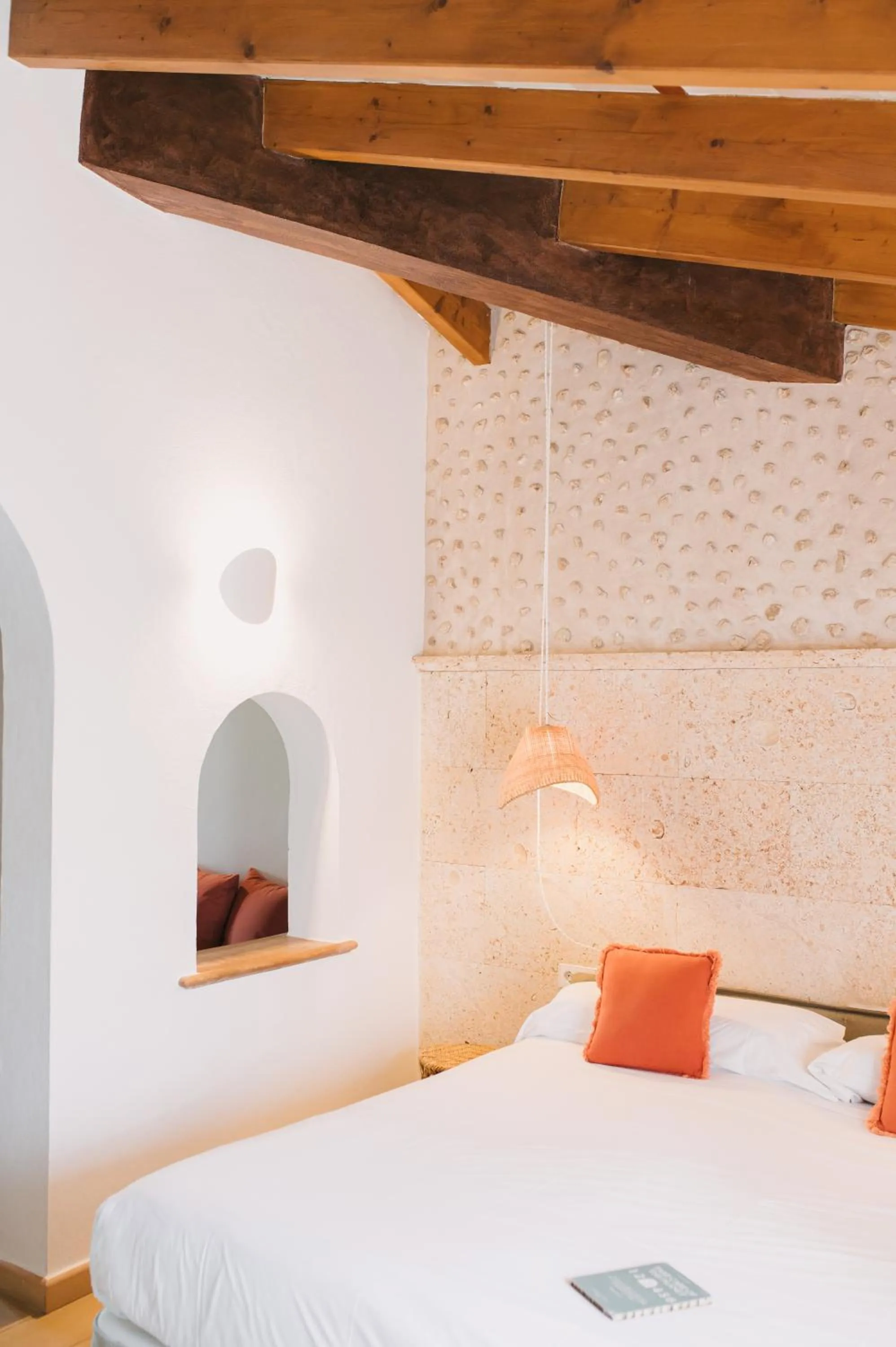 Bed in Curolla Petit Hotel